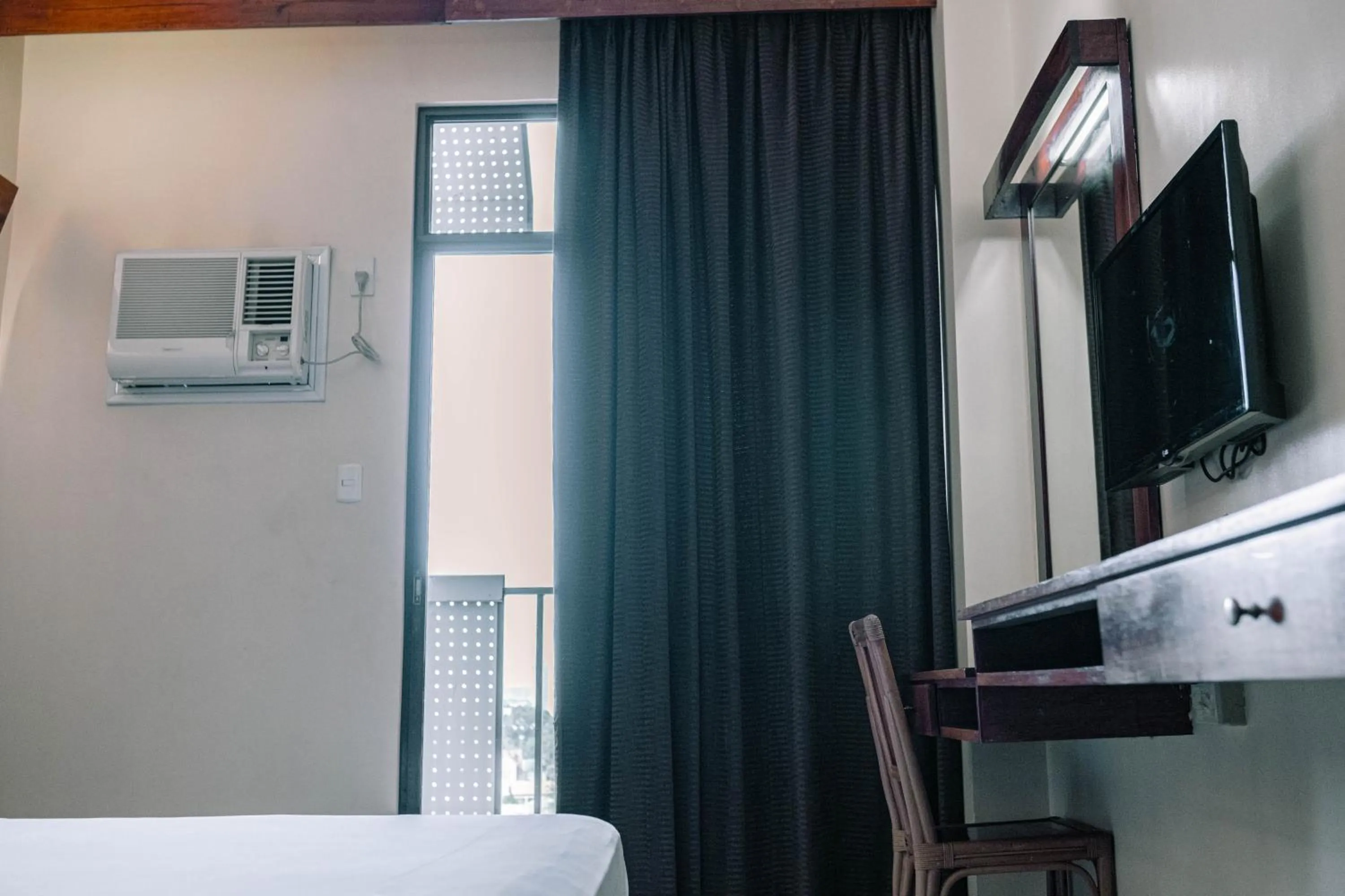 Bed in Tsai Hotel and Residences