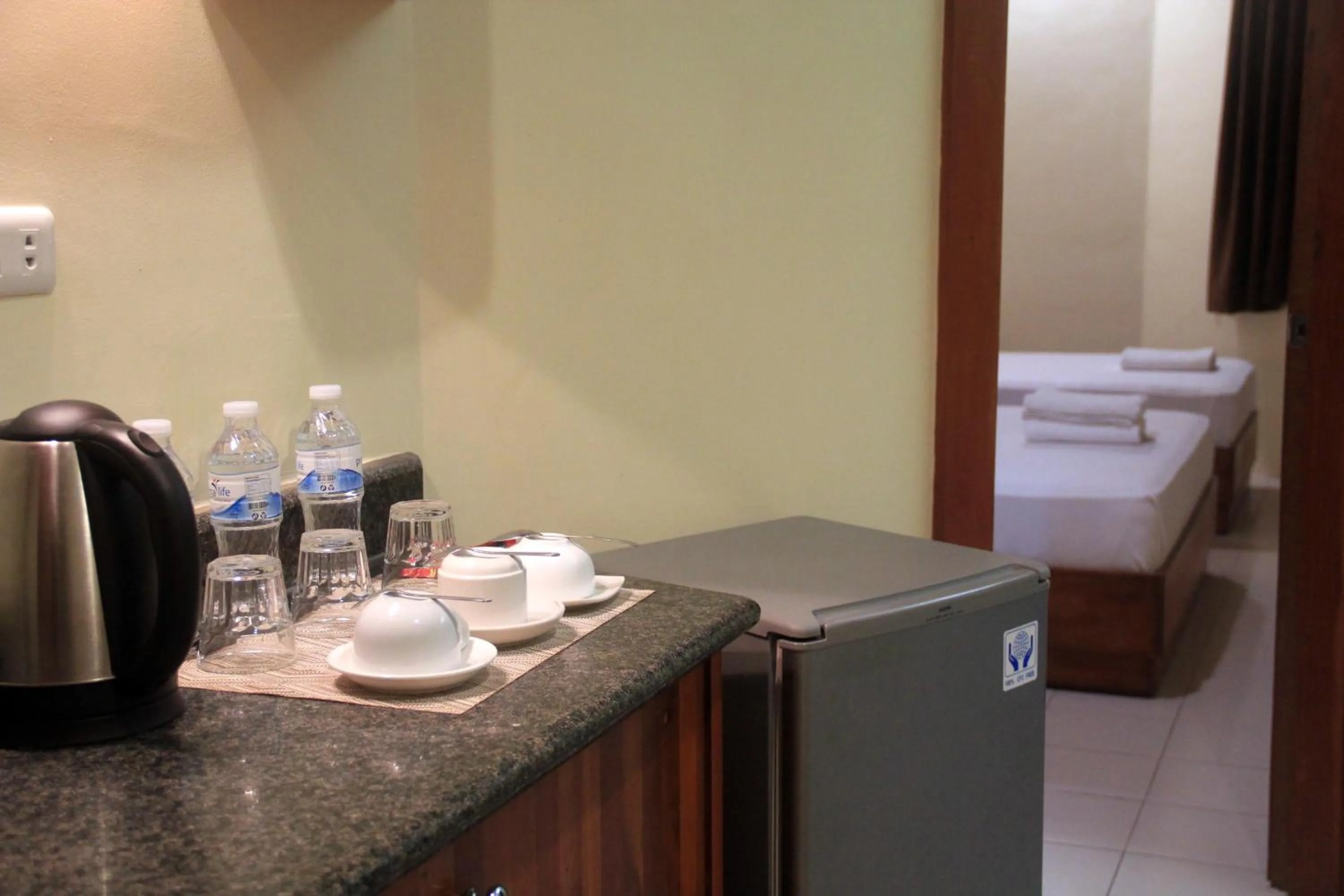 Coffee/tea facilities, Bed in Tsai Hotel and Residences