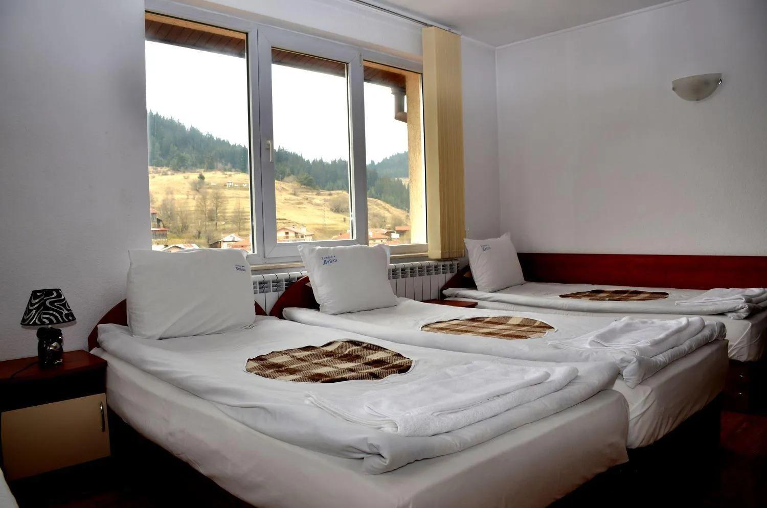Bed in Family Hotel Daisy