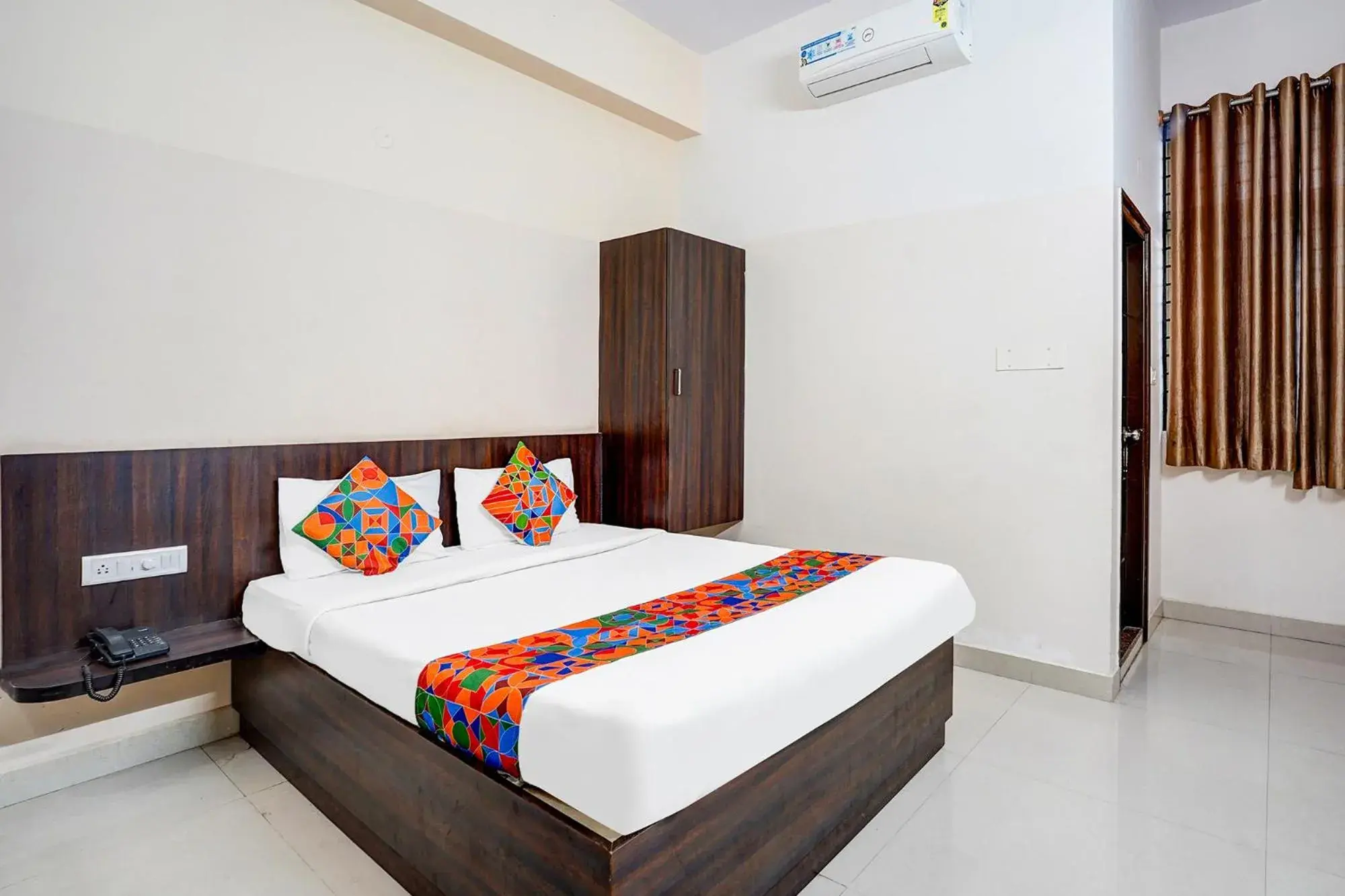 Deluxe Room - single occupancy in FabHotel Pride Image - Rajarajeshwari Nagar Deluxe Room - single occupancy in FabHotel Pride Image - Rajarajeshwari Nagar