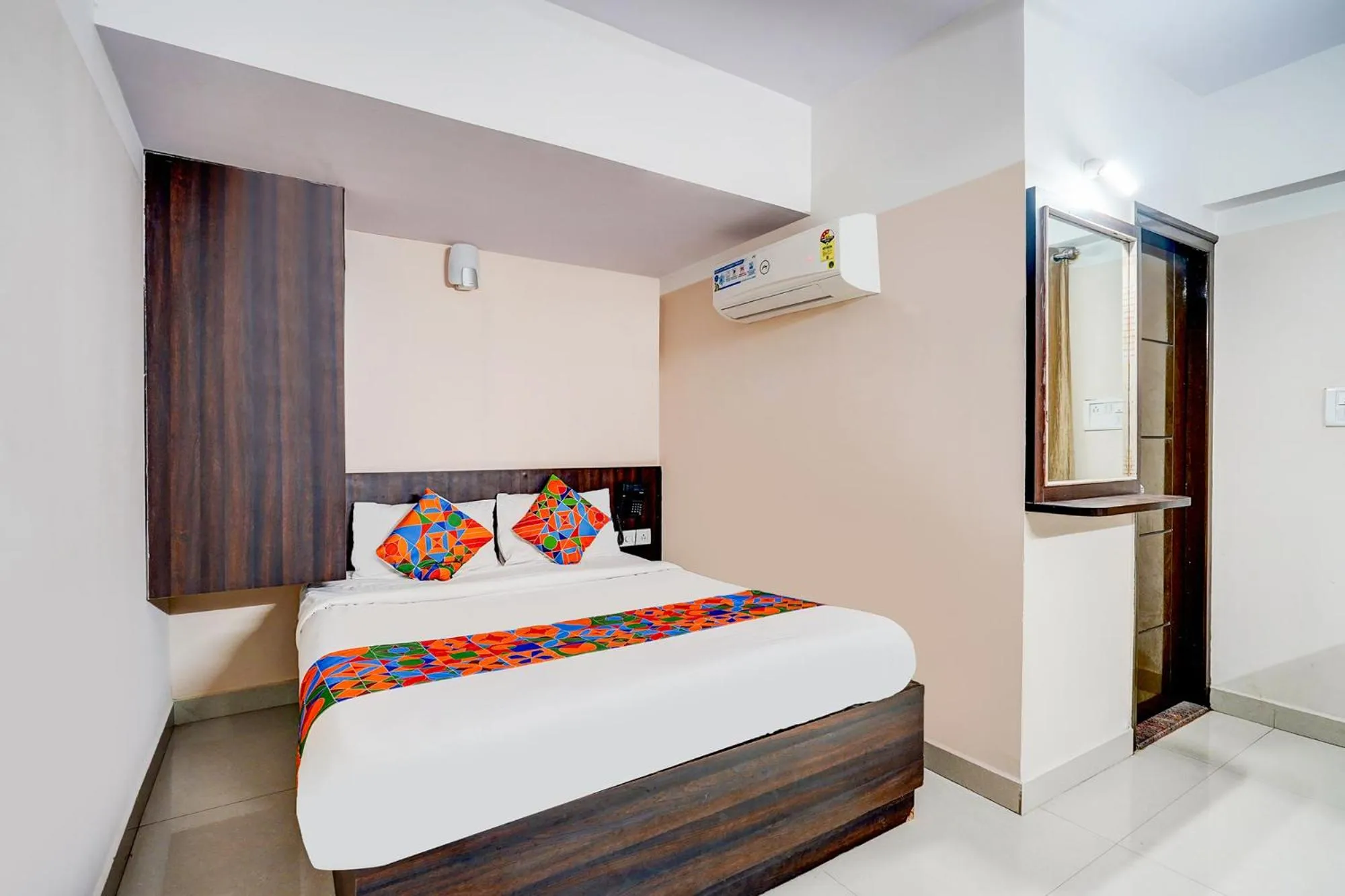 Bedroom, Bed in FabHotel Pride Image - Rajarajeshwari Nagar