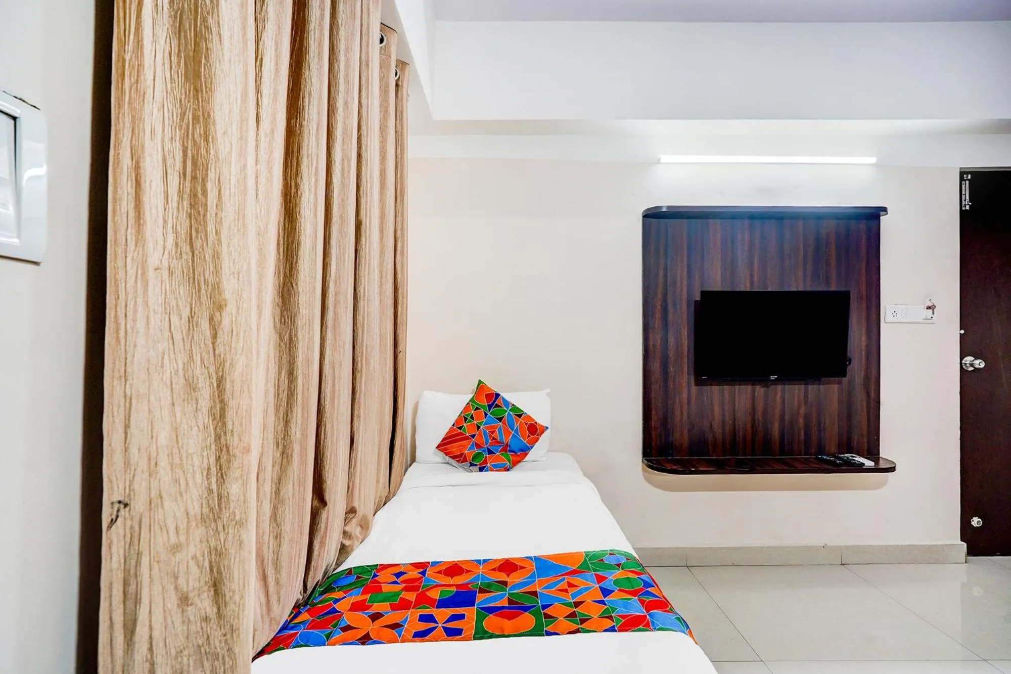 Bedroom, Bed in FabHotel Pride Image - Rajarajeshwari Nagar