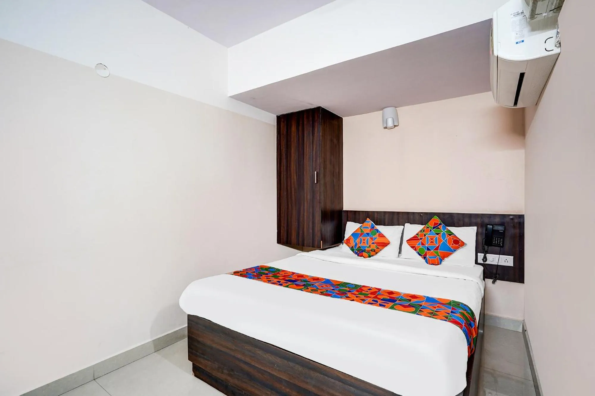 Bedroom, Bed in FabHotel Pride Image - Rajarajeshwari Nagar