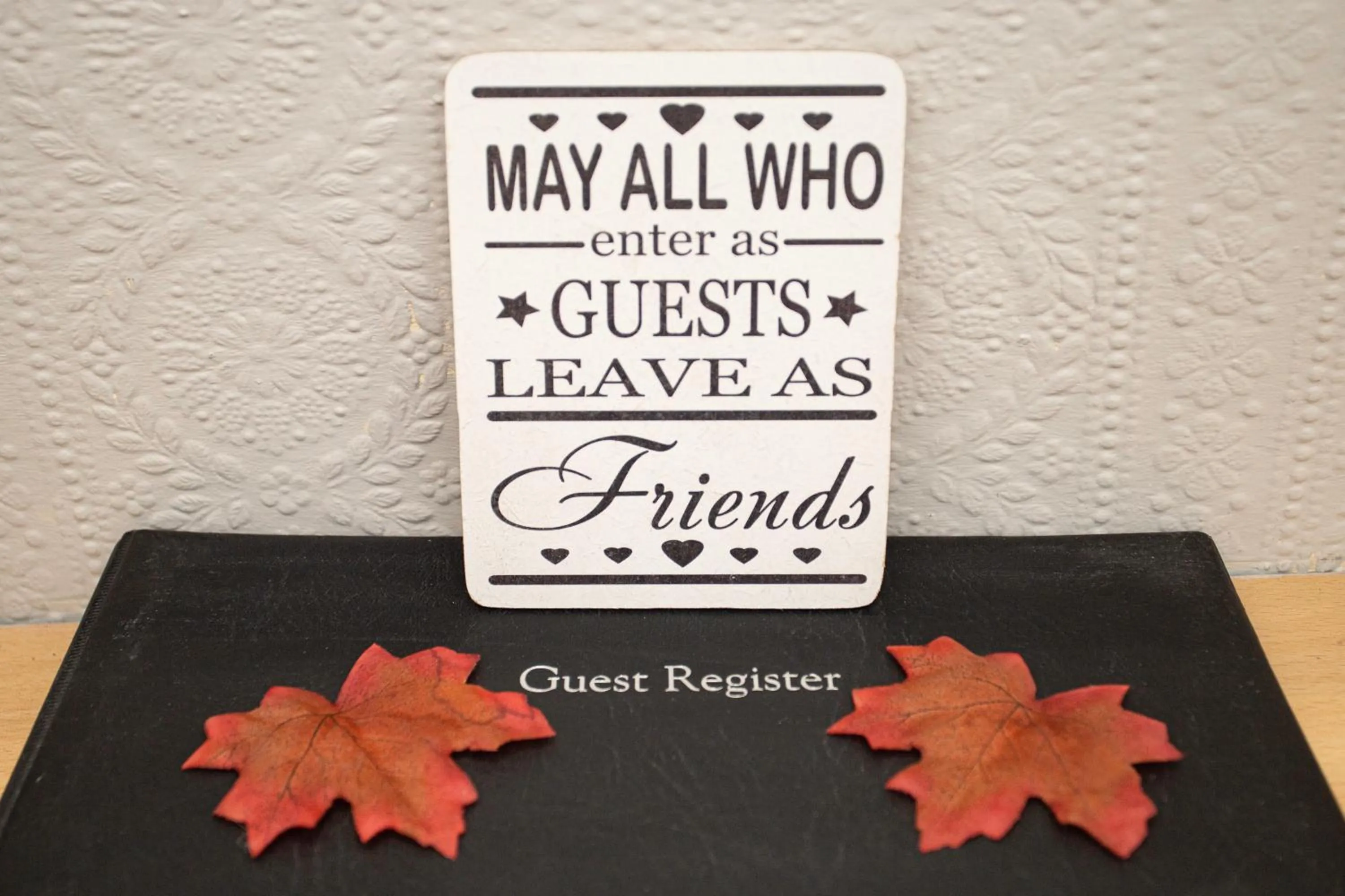 Property logo or sign in Mariners Guest House