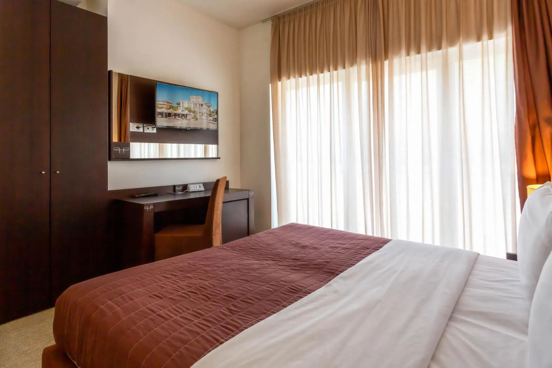 Bed in Hotel Petit Palais