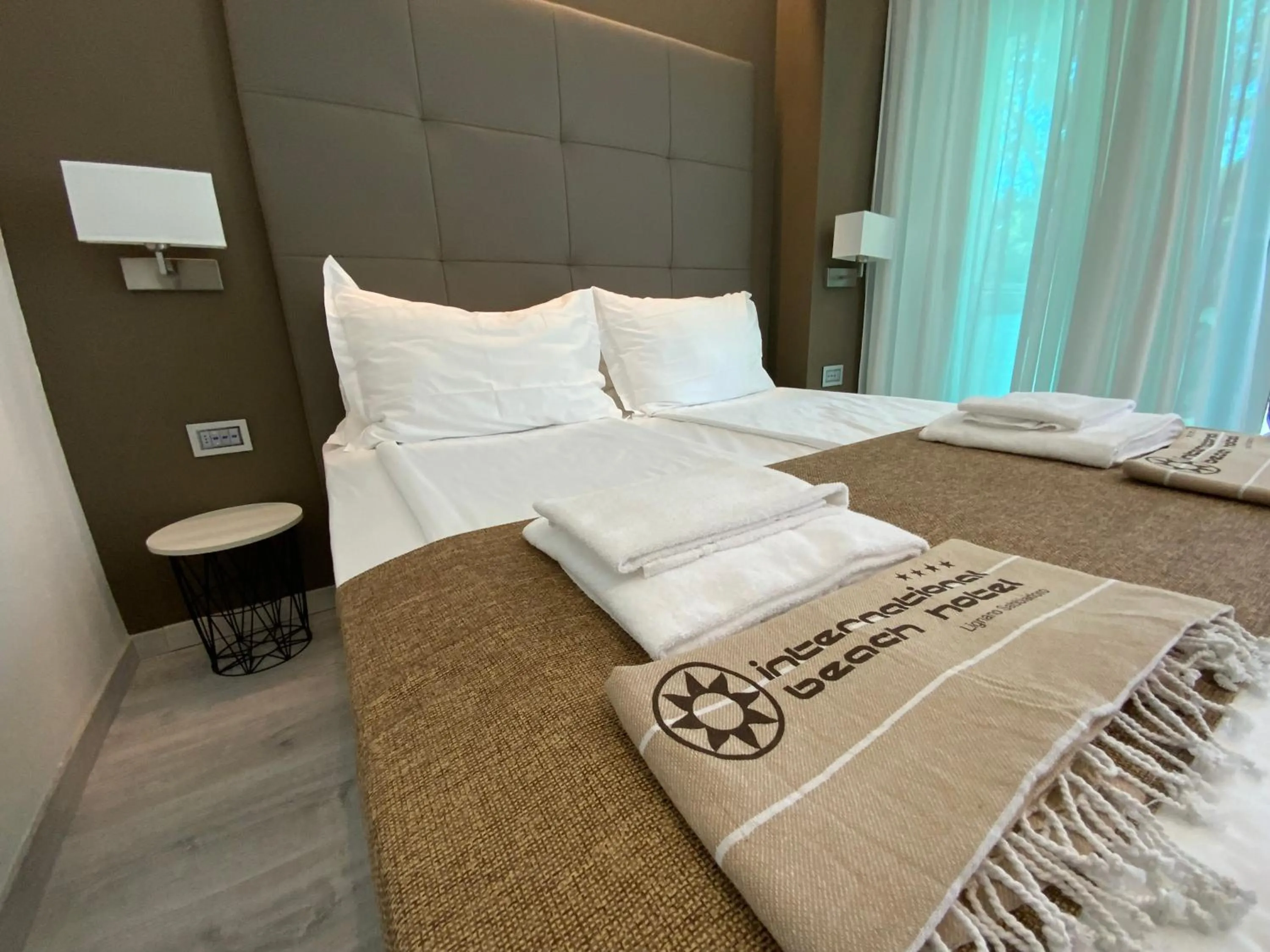 Bedroom, Bed in International Beach Hotel