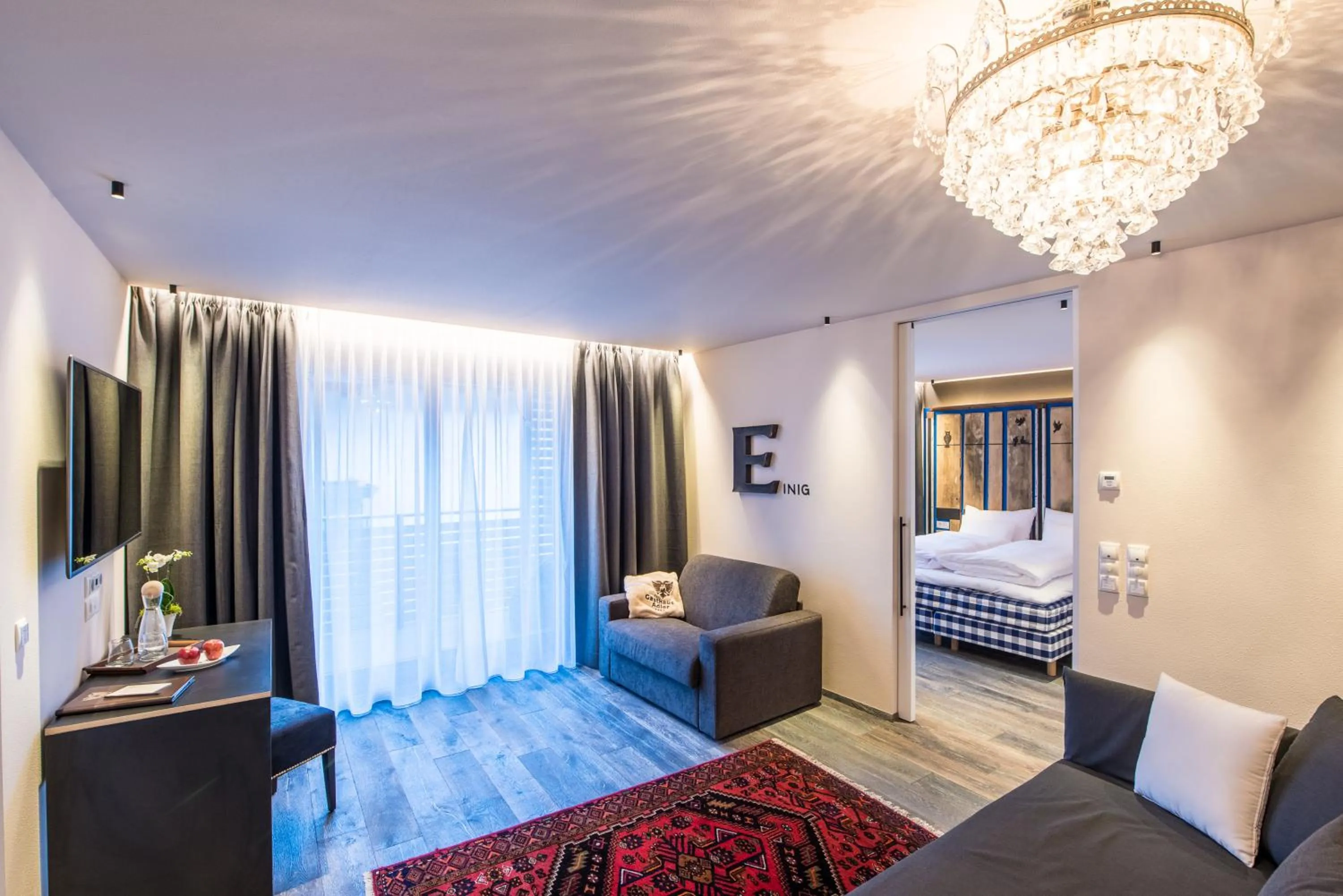 Communal lounge/ TV room, Bed in Adler Suite & Stube