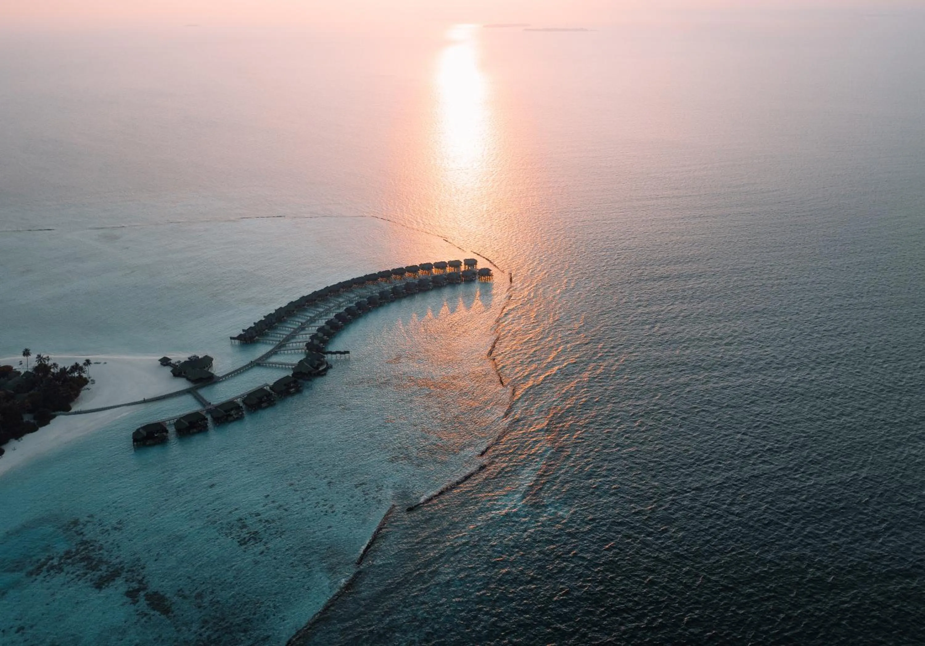 Sunset in Sun Siyam Iru Fushi with Free Transfer