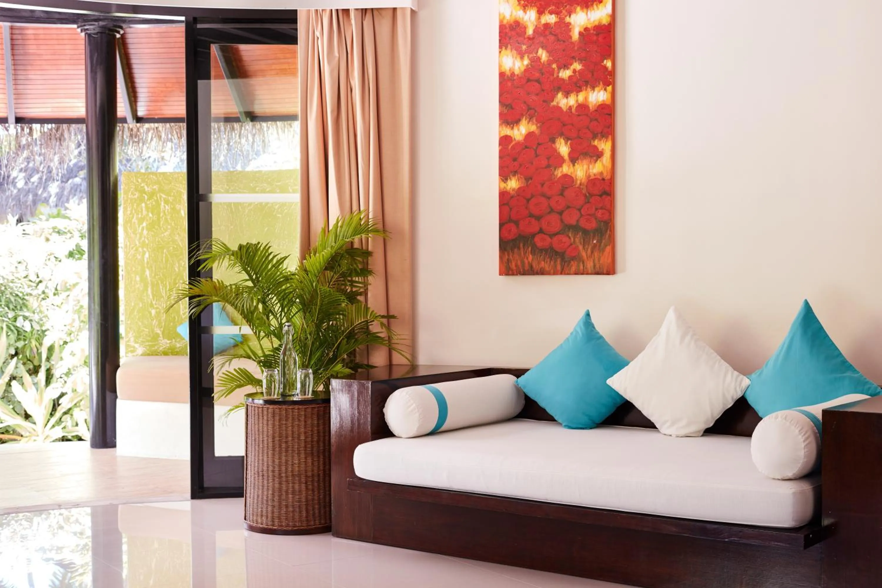 Living room in Sun Siyam Iru Fushi with Free Transfer