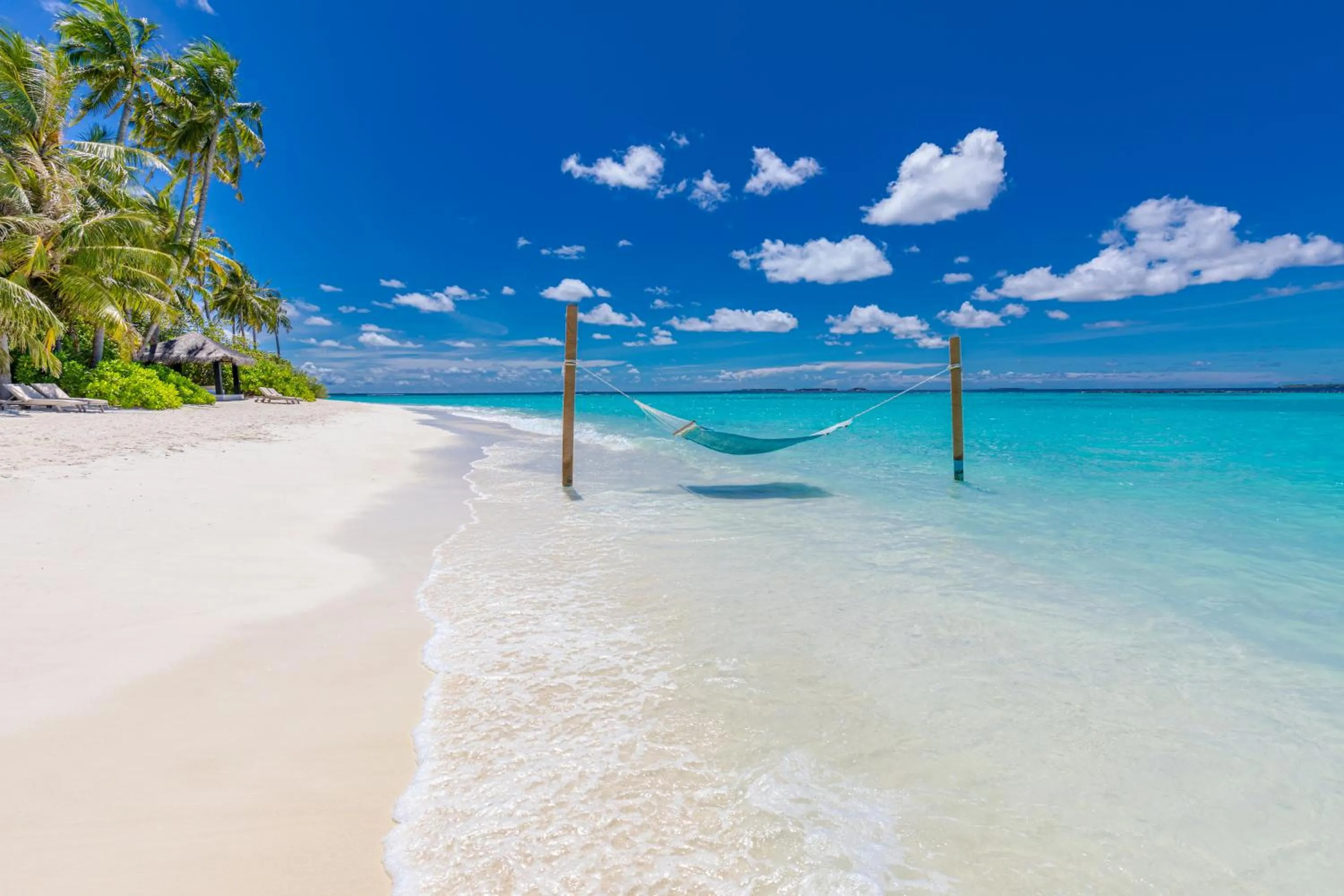 Beach in Sun Siyam Iru Fushi with Free Transfer