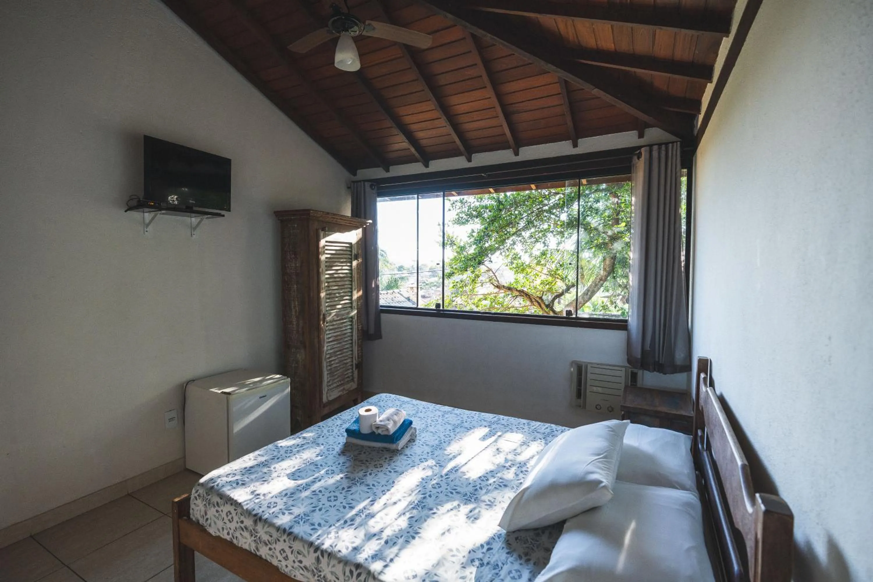 Bed in POUSADA ENCANTO DO AMOR