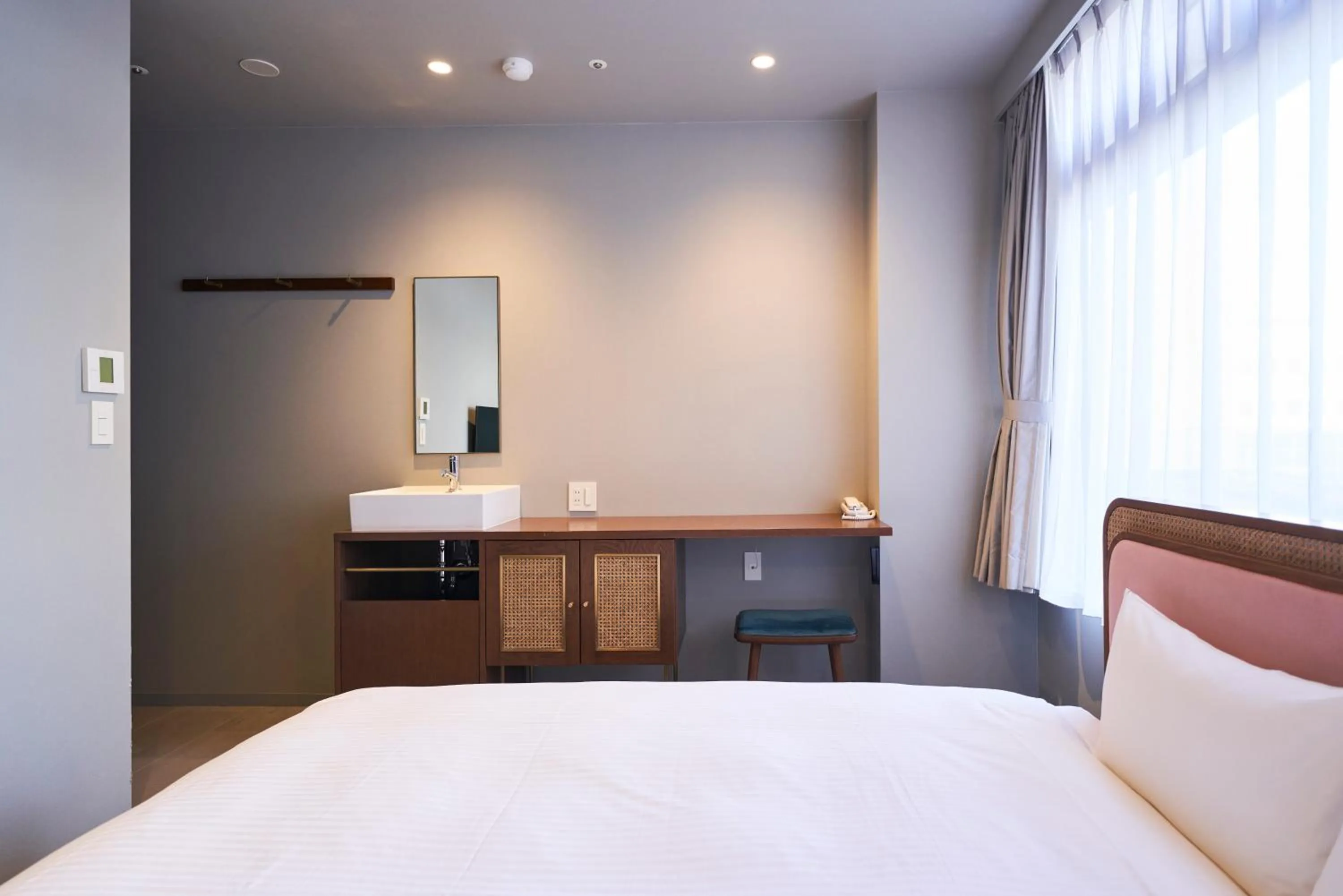 Bed in Mito Sannomaru Hotel