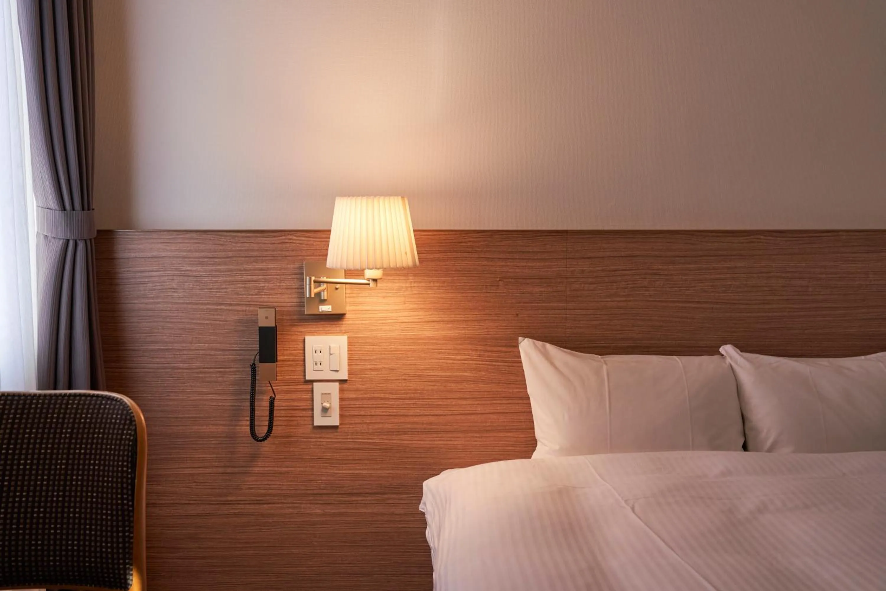 Bed in Mito Sannomaru Hotel