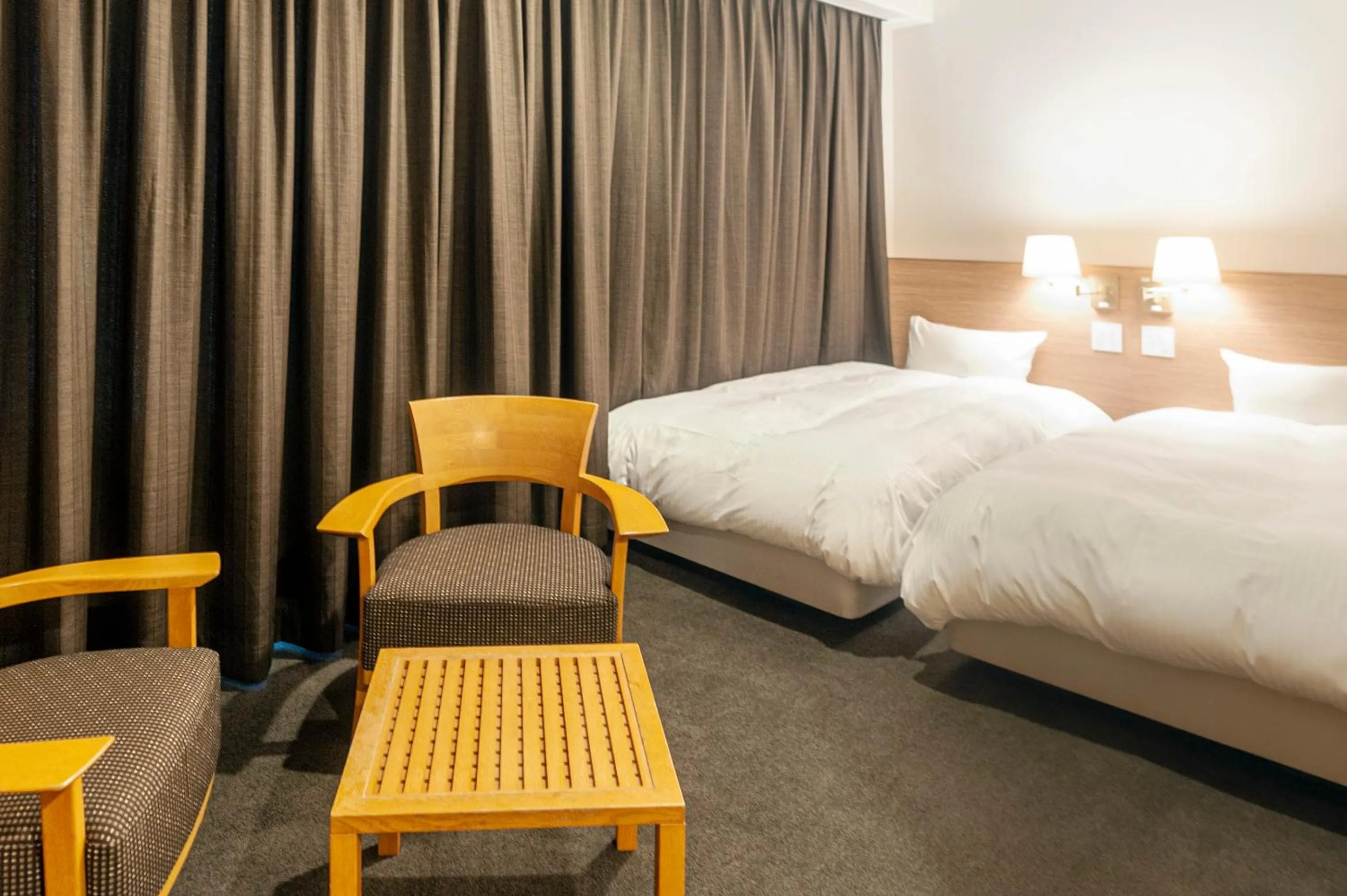 Bed in Mito Sannomaru Hotel