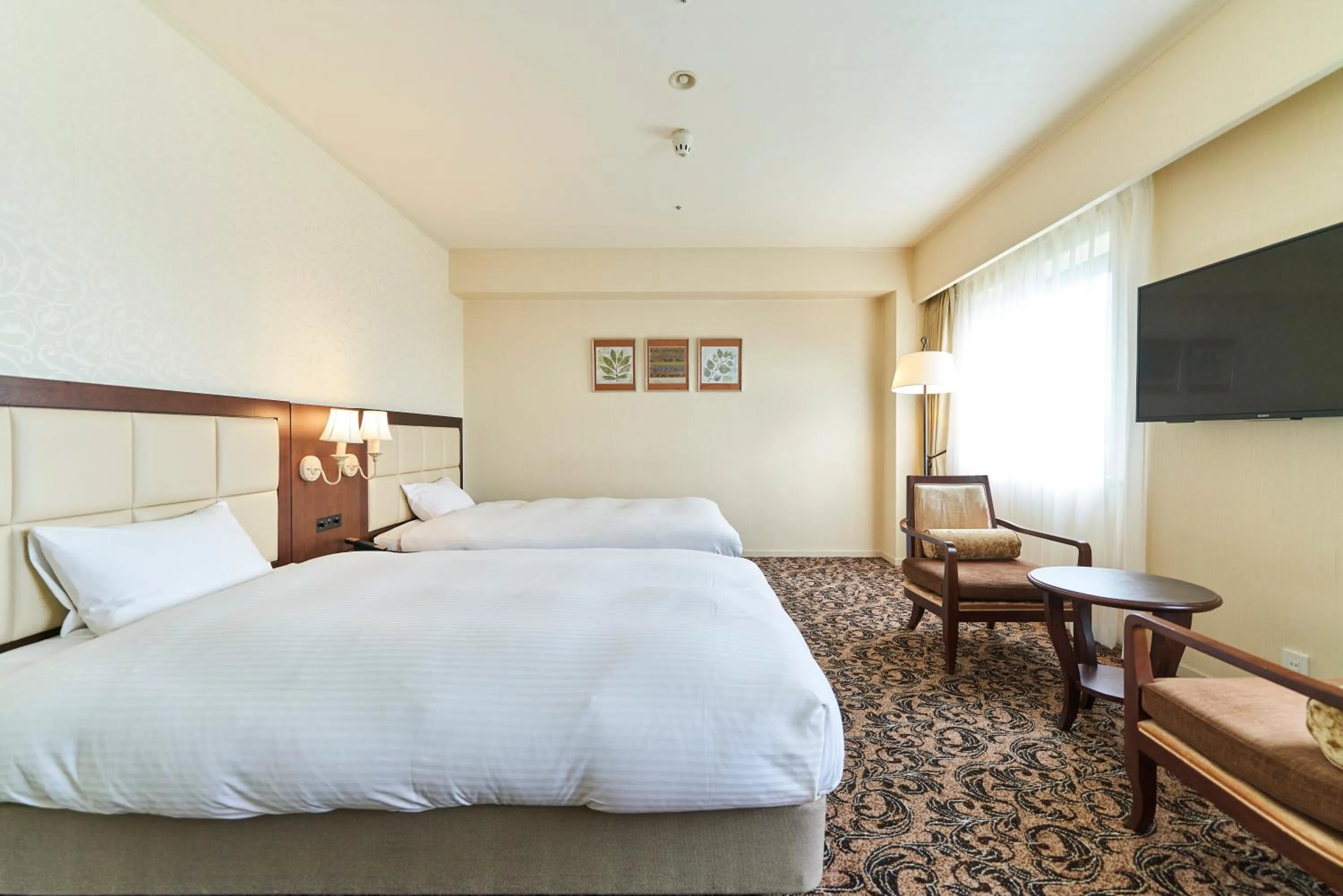 Bed in Saitama Grand Hotel Fukaya