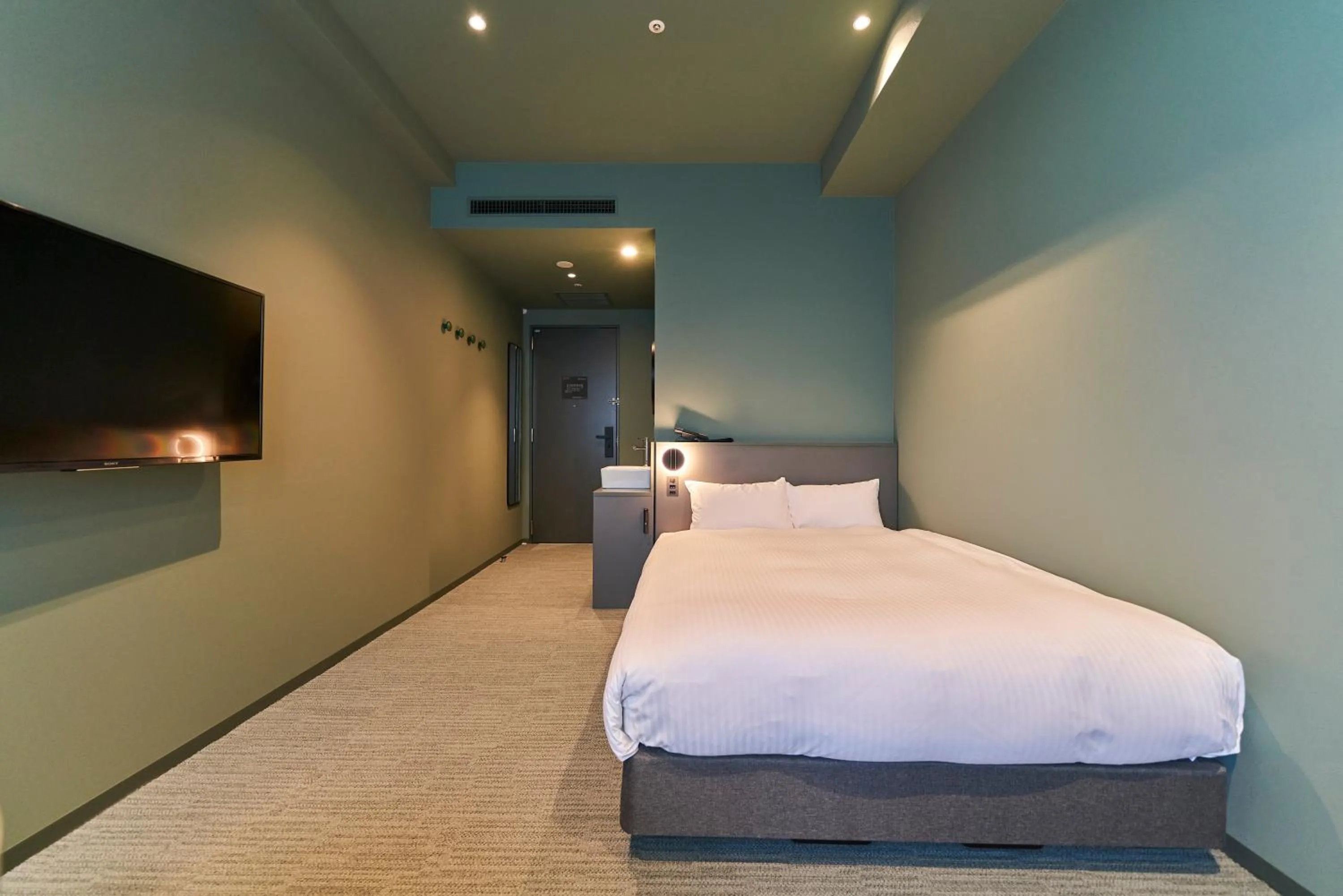 Bed in Saitama Grand Hotel Fukaya