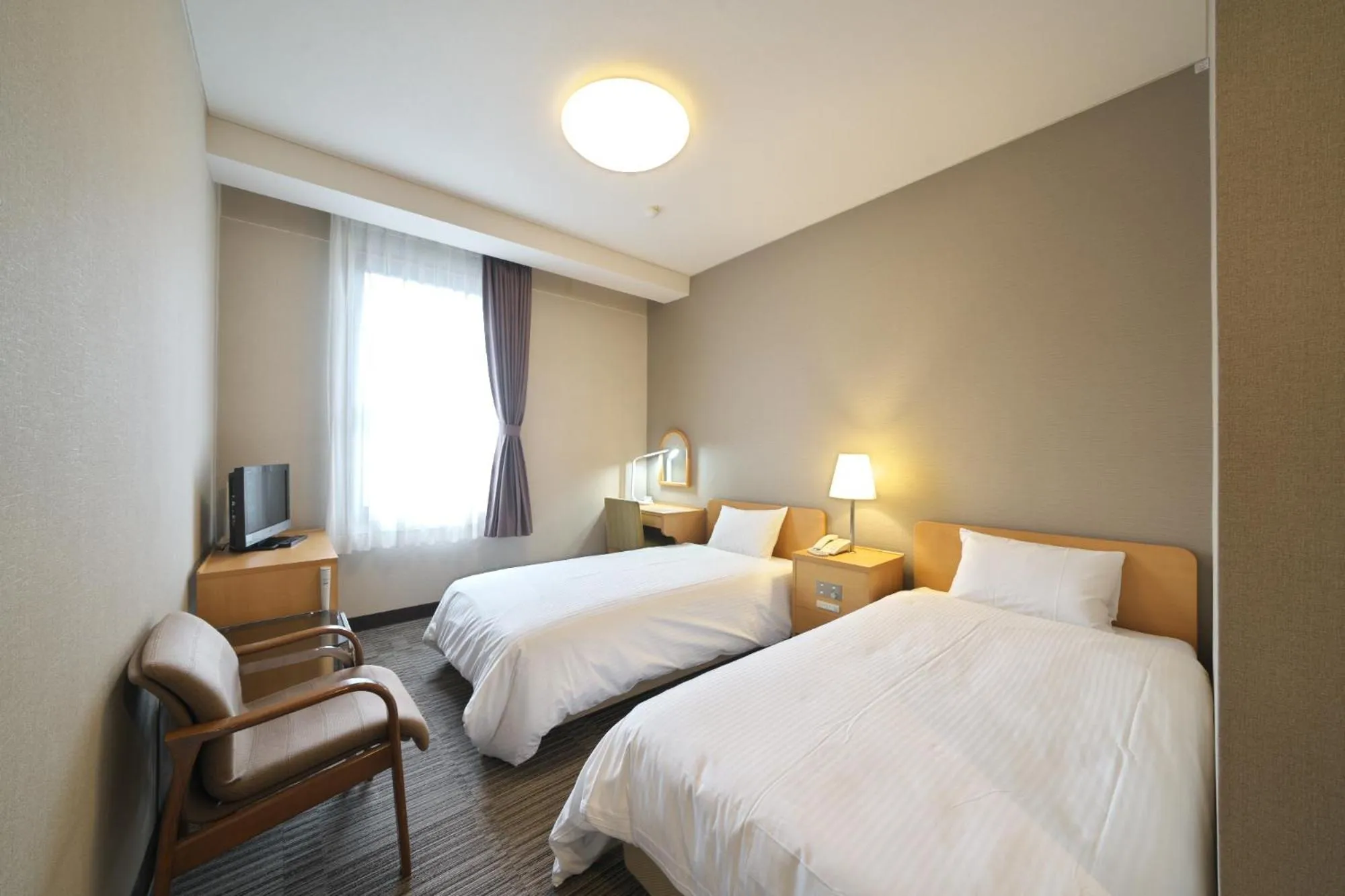 Bed in Hotel Kanazawa Kenrokusou