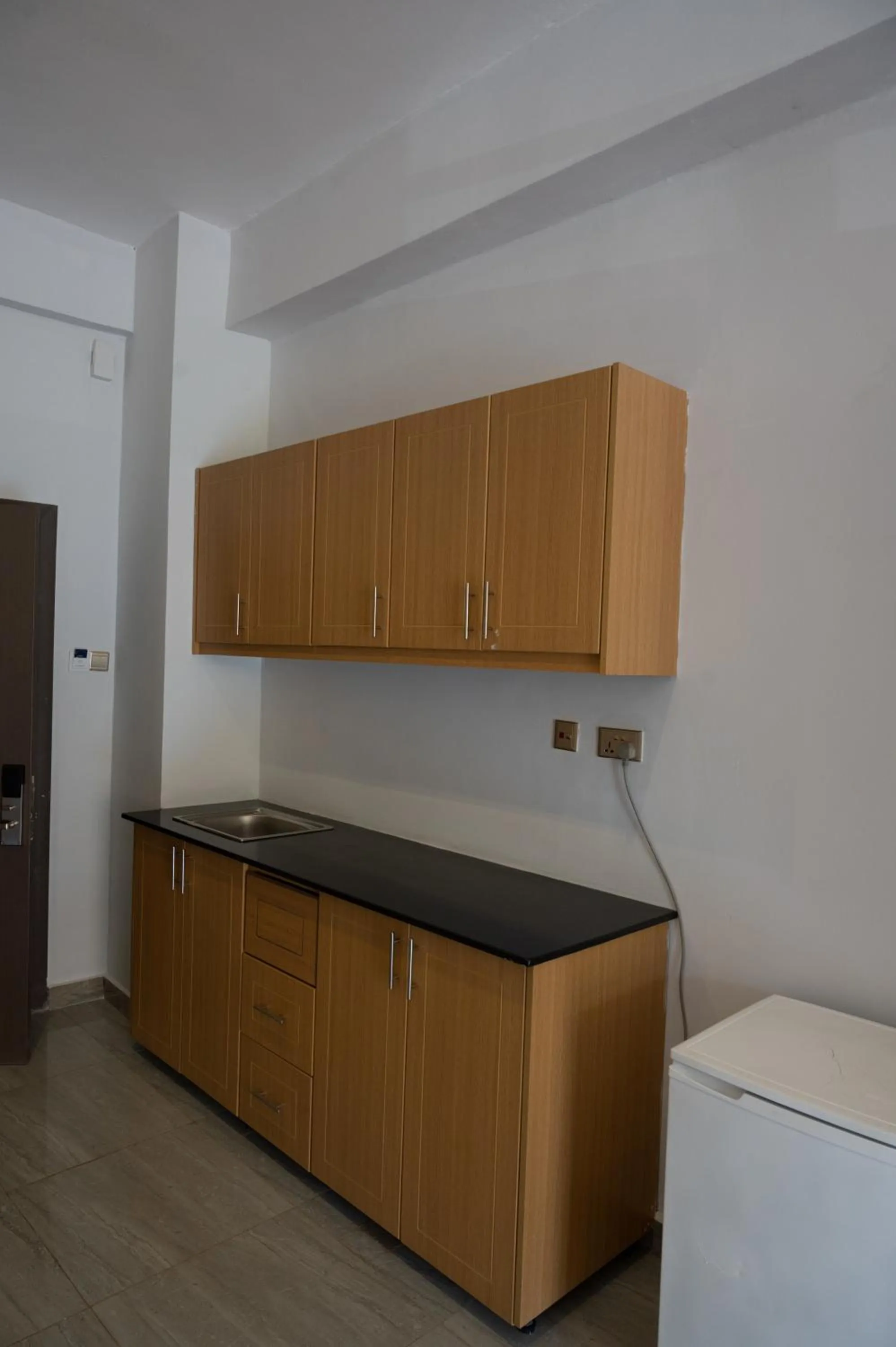 Kitchen or kitchenette in The Voice Hotel