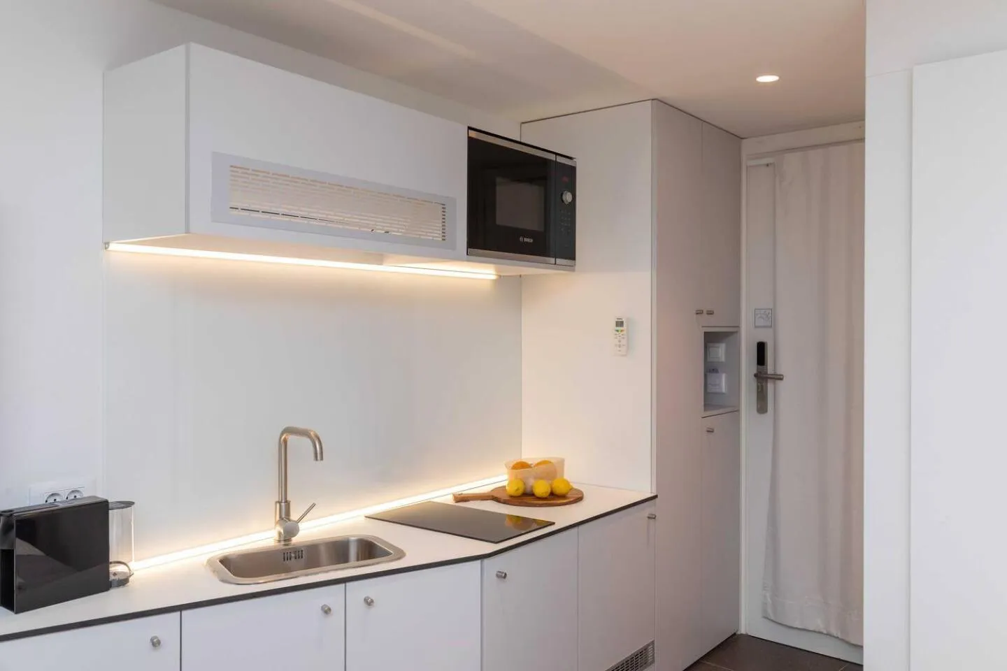 Kitchen or kitchenette in Old Town Apartments u nikse