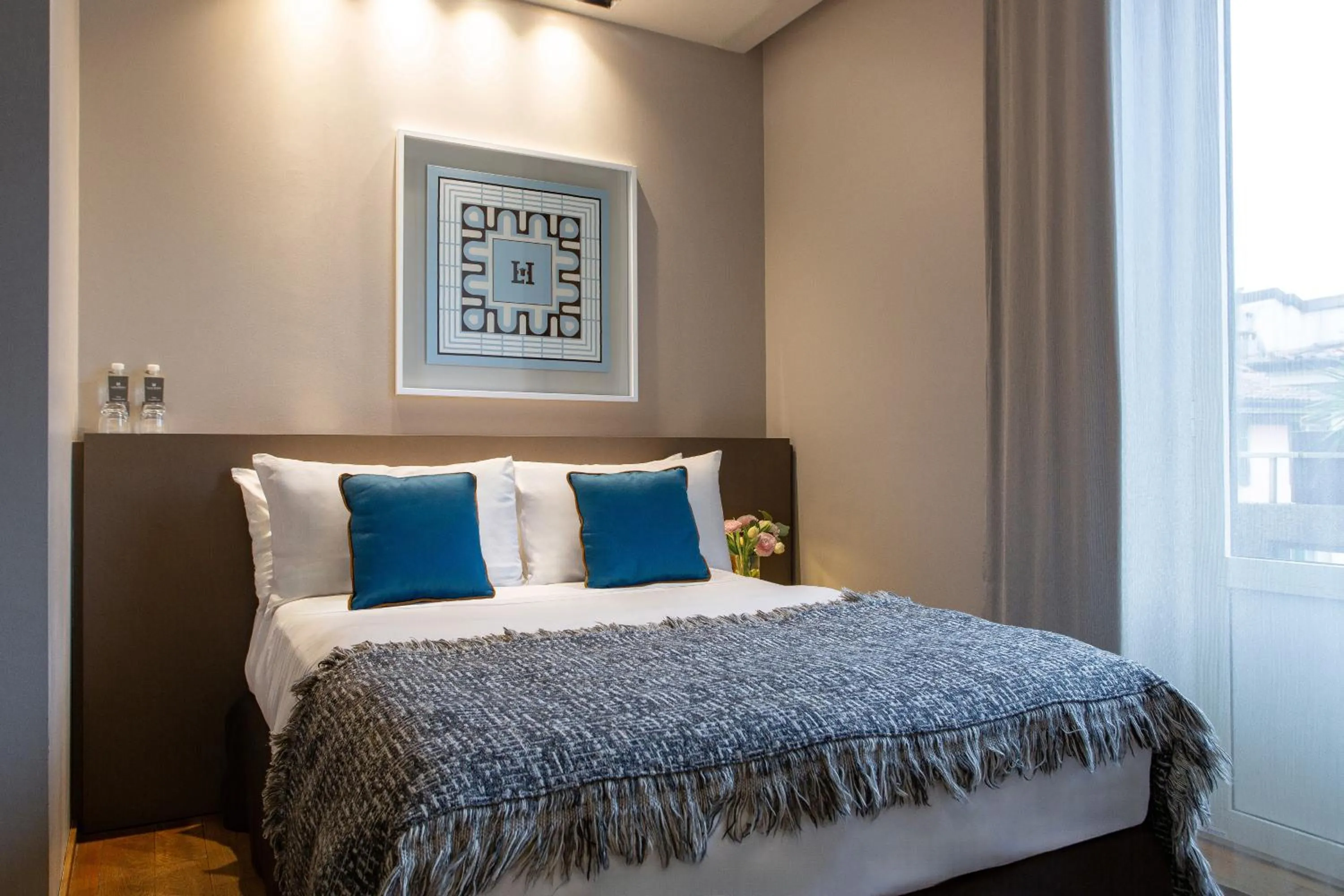 Bed in Posta Design Hotel