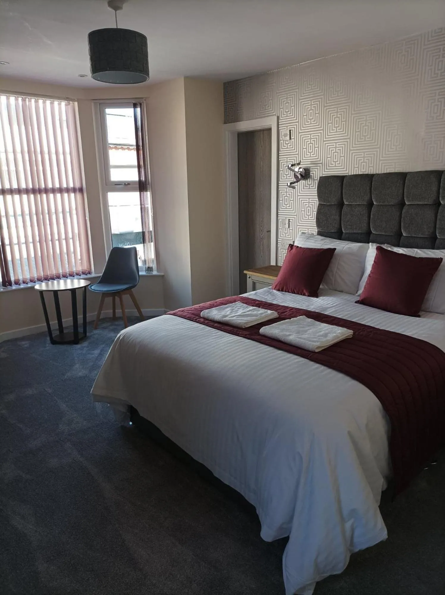 Bed in Rose James Apartments
