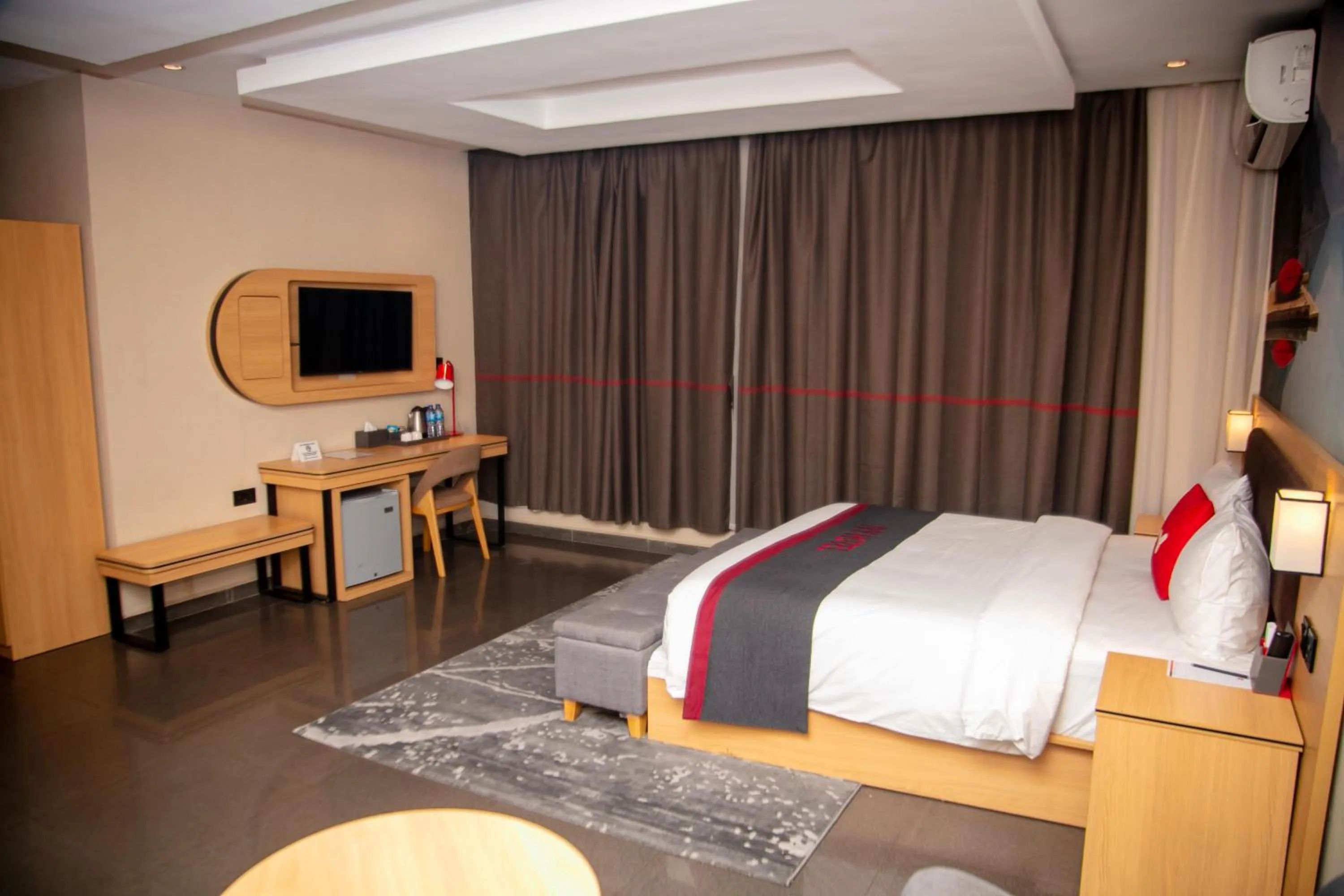 Bed in Ivy Hotel Emerald