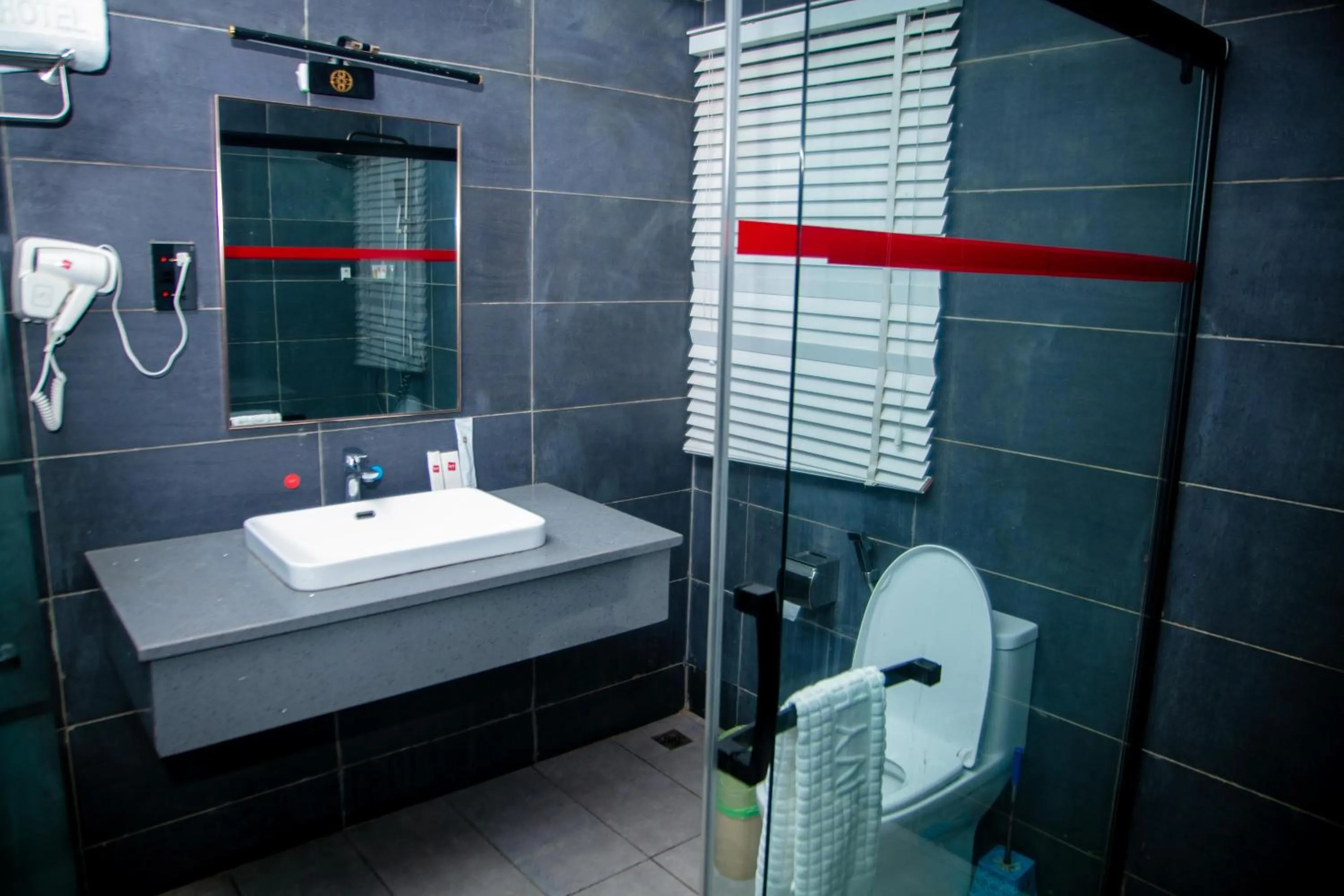 Bed in Ivy Hotel Emerald