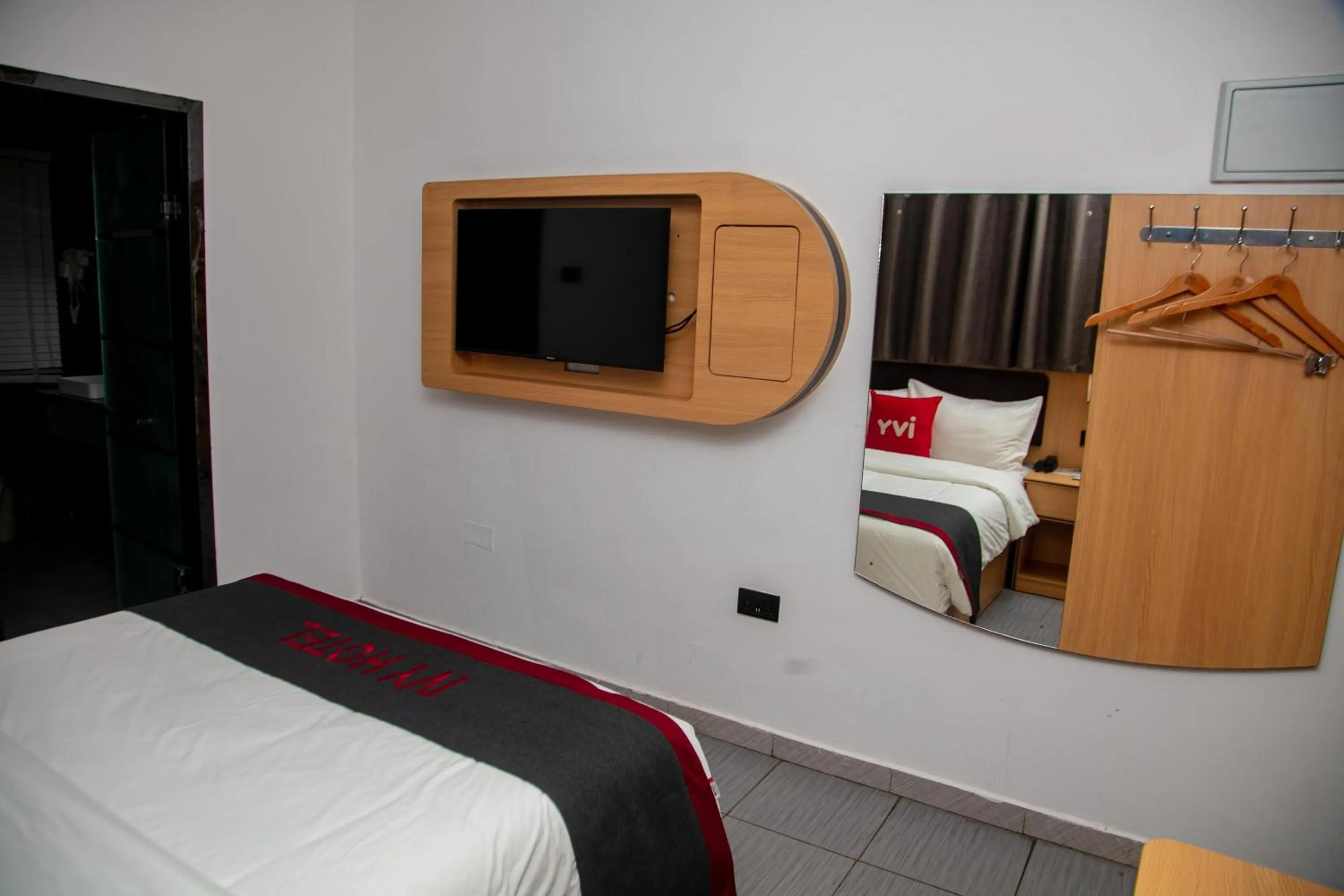 Bed in Ivy Hotel Emerald