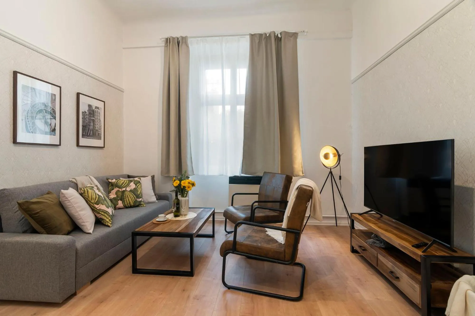 Communal lounge/ TV room in Florenc Apartments Prague 1 by Michal&Friends