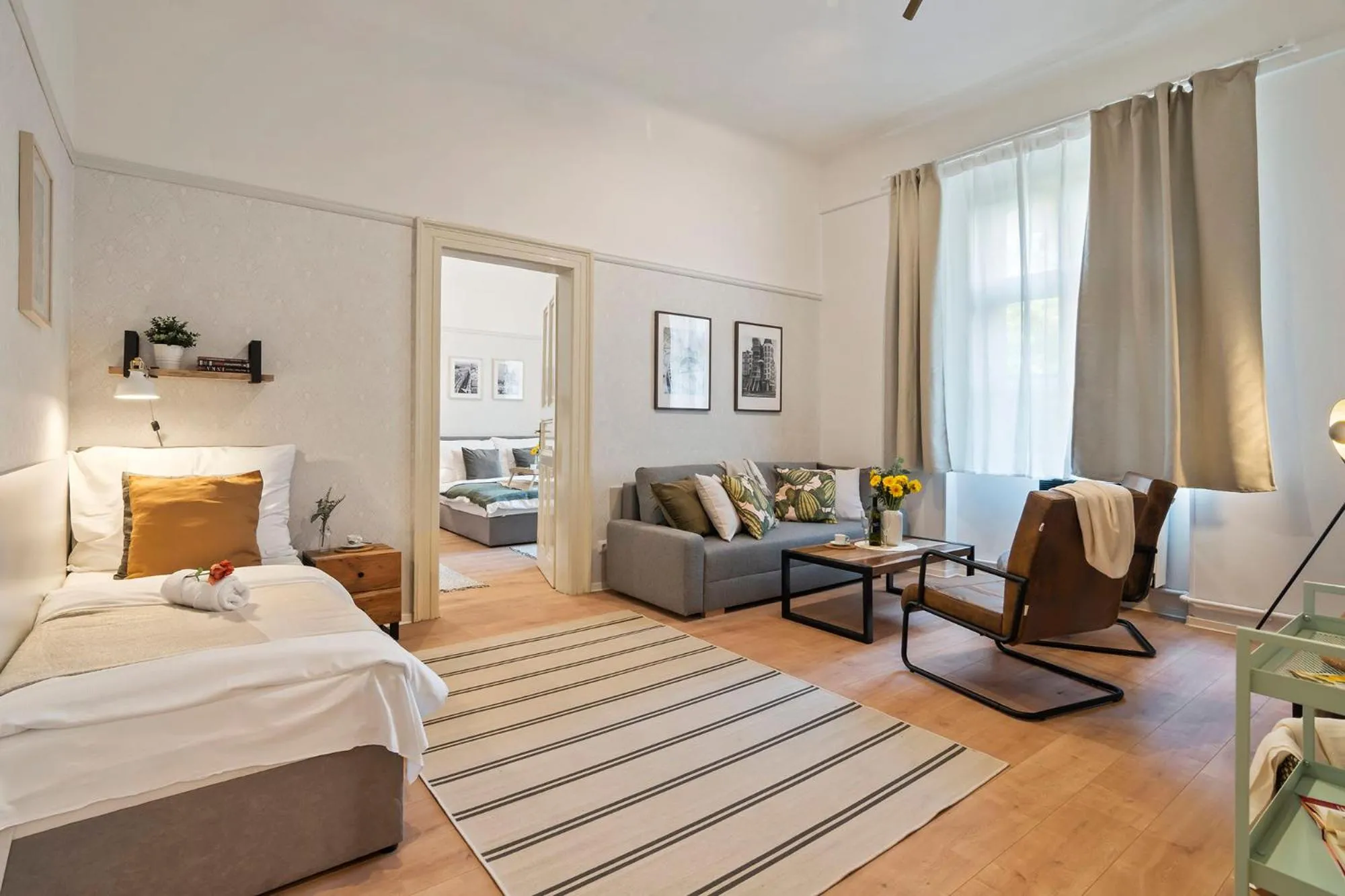 Living room, Bed in Florenc Apartments Prague 1 by Michal&Friends