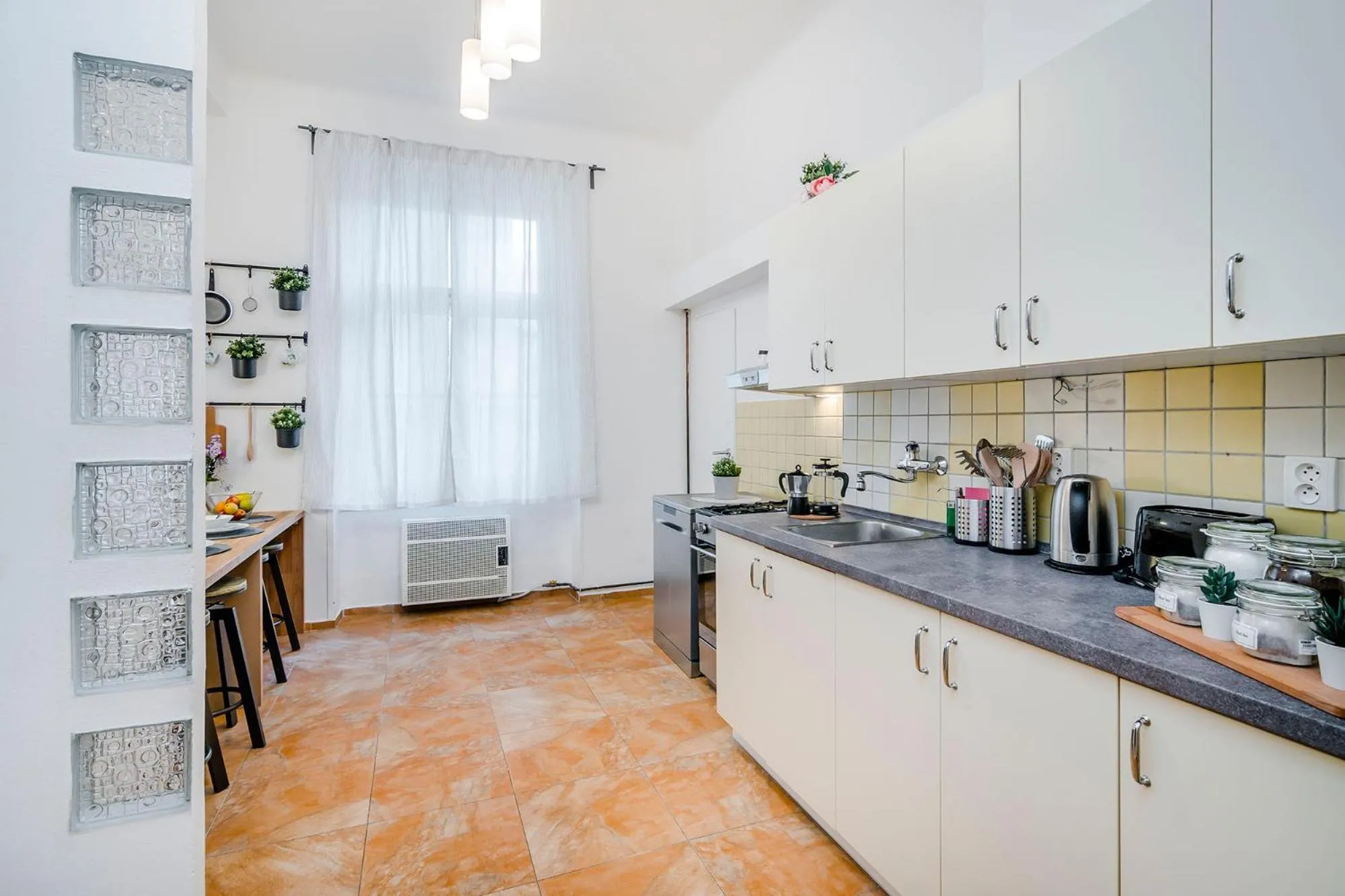 kitchen in Florenc Apartments Prague 1 by Michal&Friends