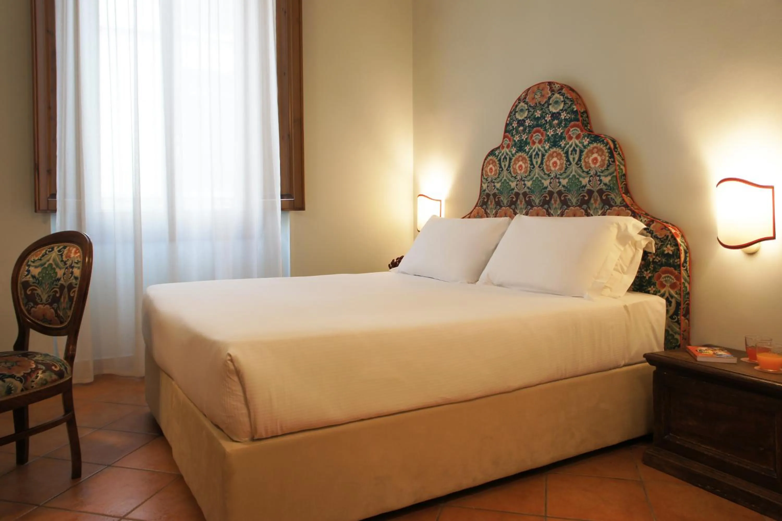 Bed in Hotel Galileo