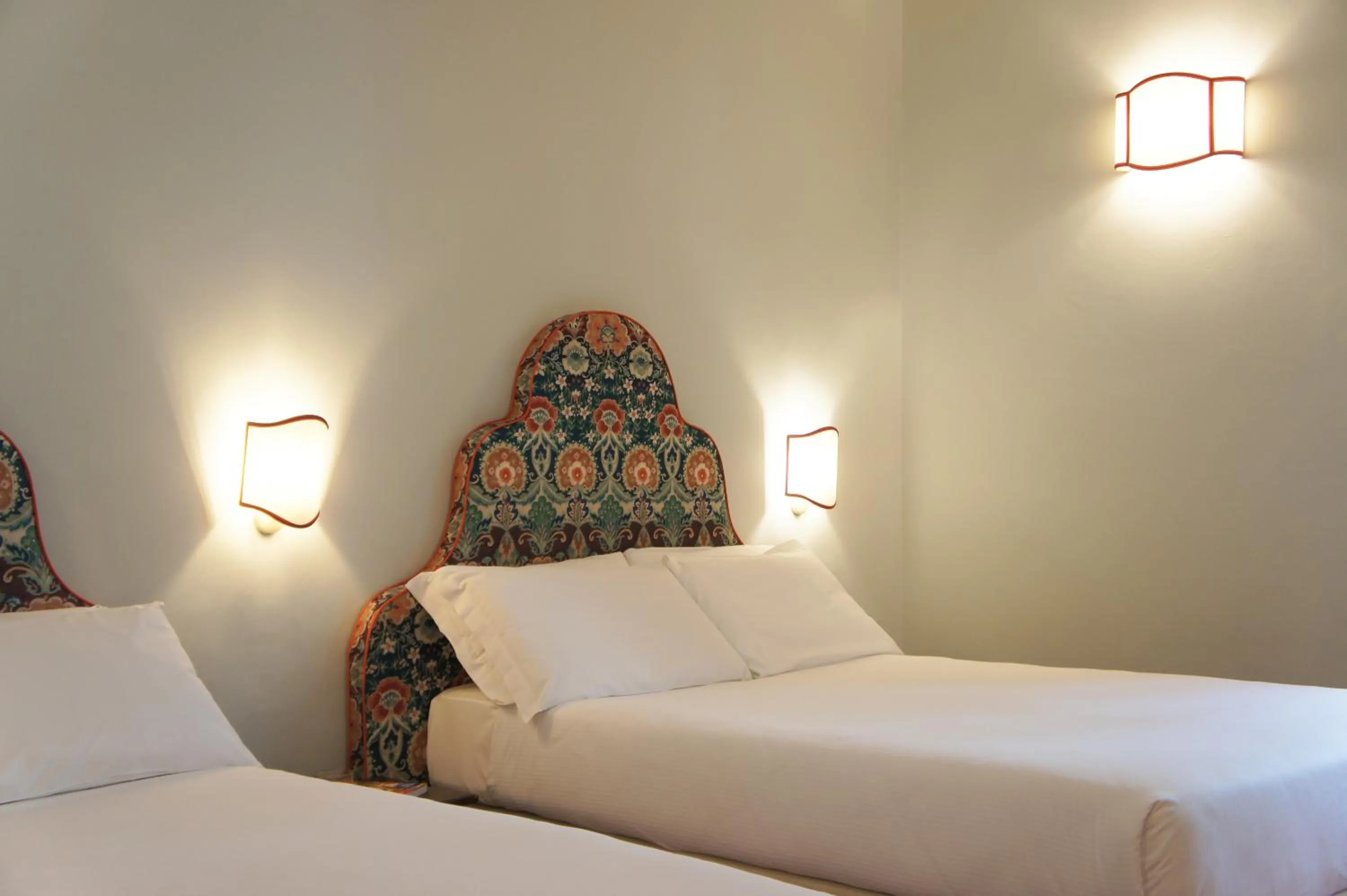 Bed in Hotel Galileo