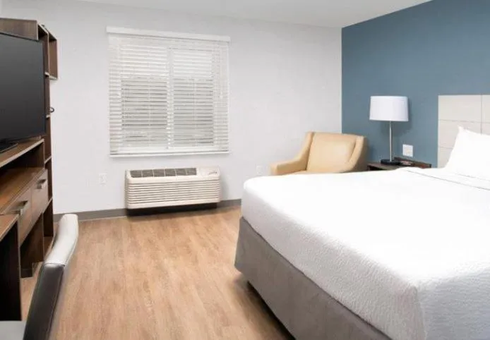 Bed in WoodSpring Suites Littleton-South Denver