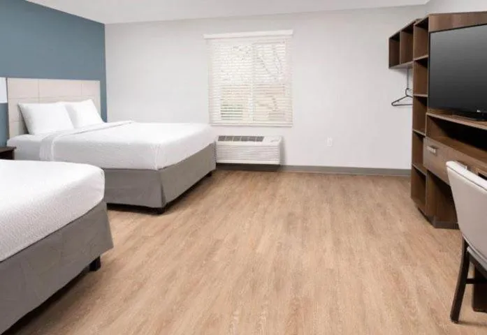 Bed in WoodSpring Suites Littleton-South Denver