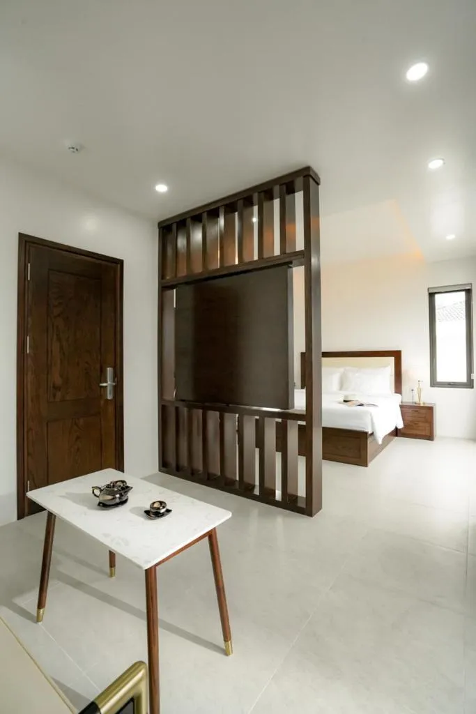 Living room, Bed in DAD Resort Phú Quốc