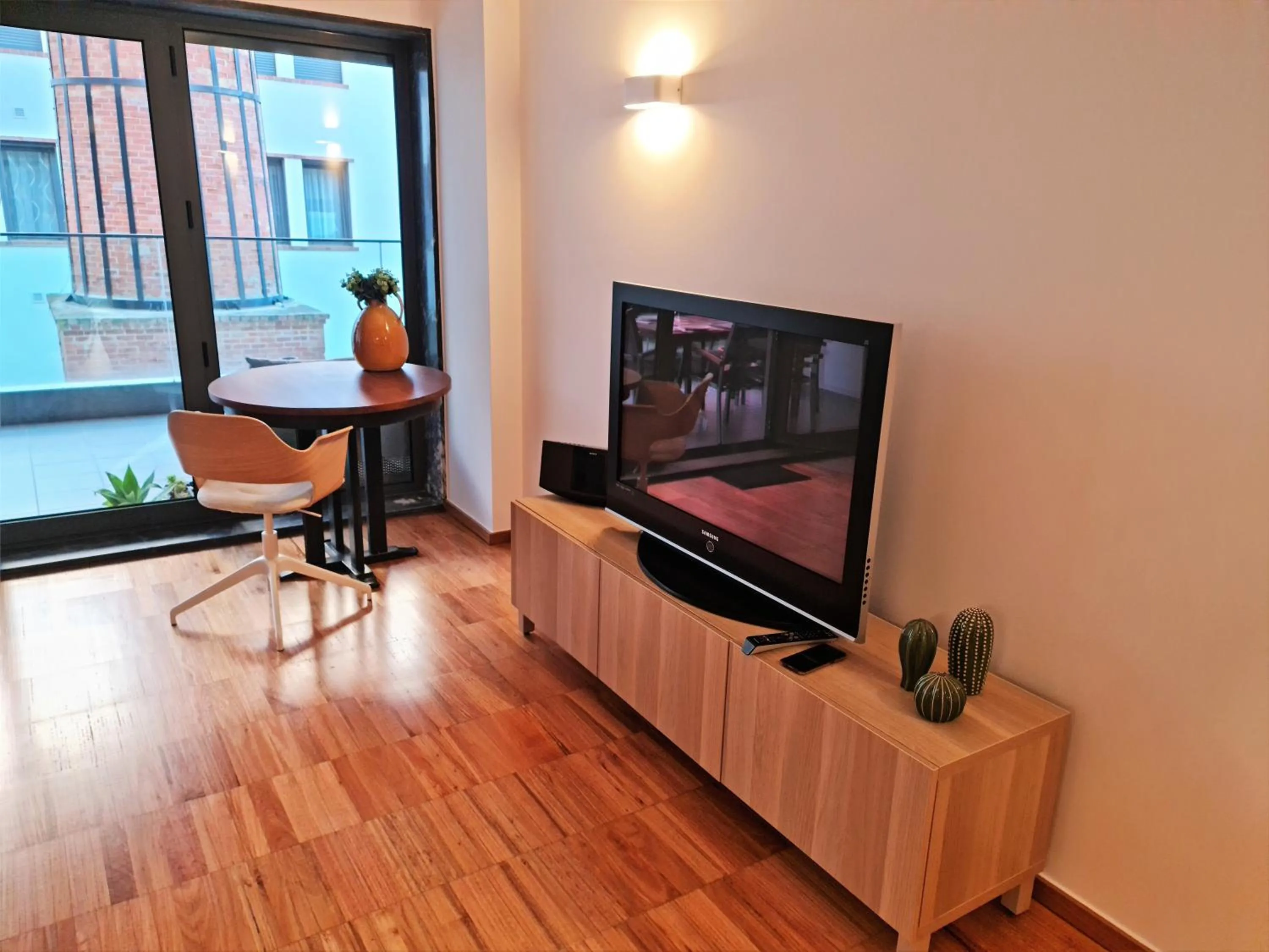Communal lounge/ TV room in Lagos Factory Yellow by Marina with AC