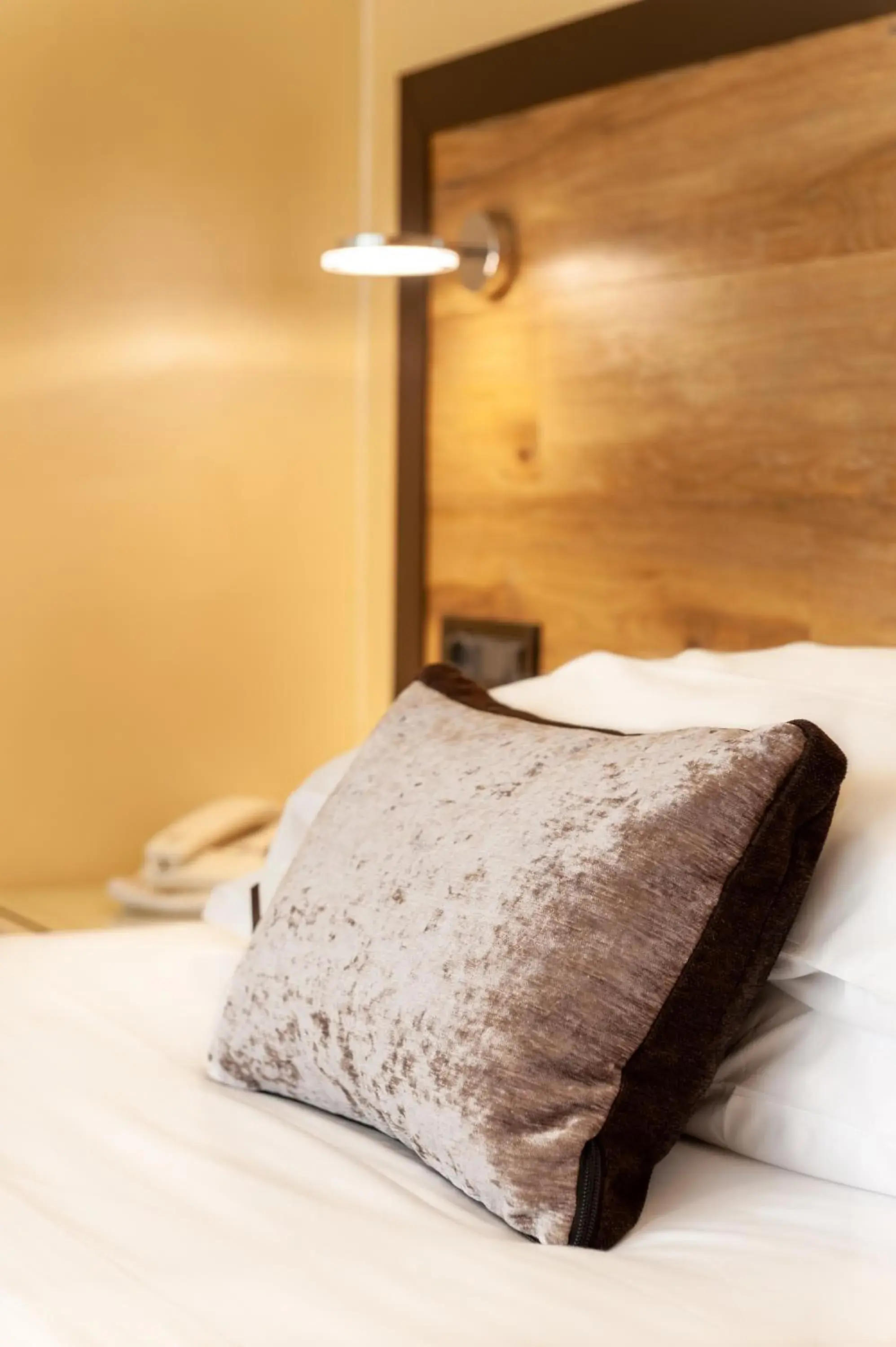 Bed in Augustus Hotel Bed in Augustus Hotel