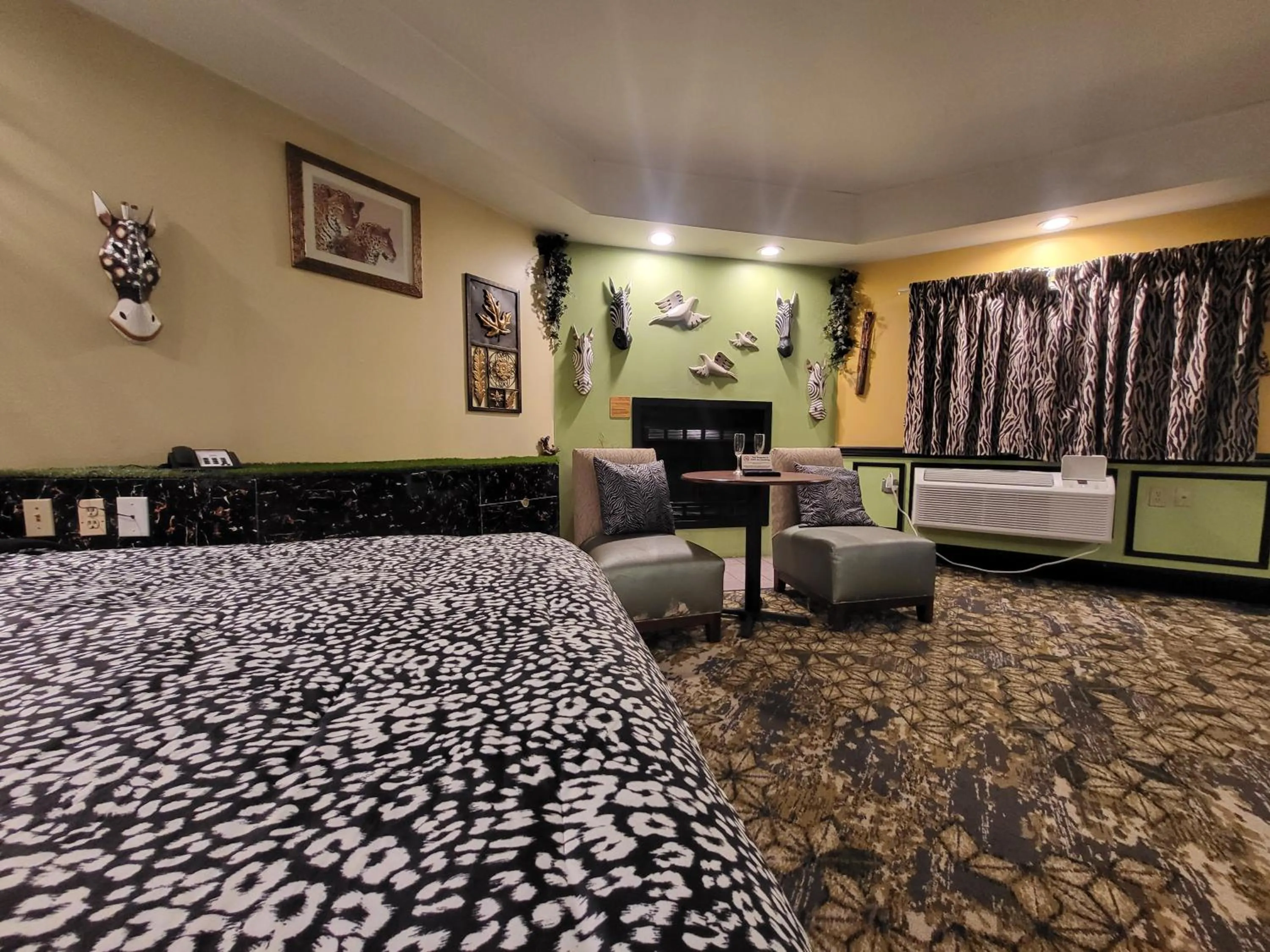 Seating area, Bed in Inn of the Dove - Romantic Luxury Suites with Jacuzzi & Seasonal Fireplace at Harrisburg-Hershey-Philadelphia, PA