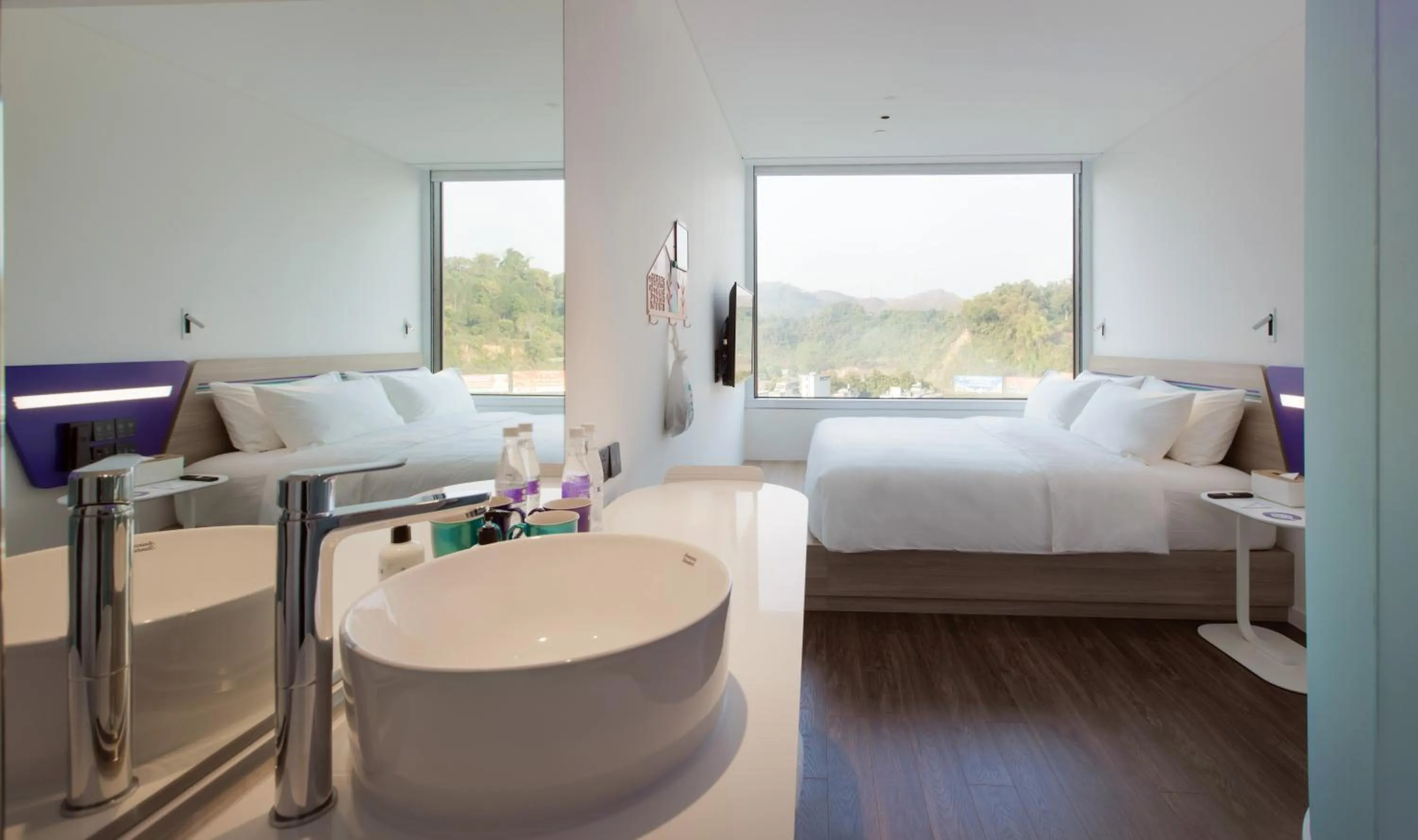 Photo of the whole room, Bed in SOJO Hotel Lao Cai