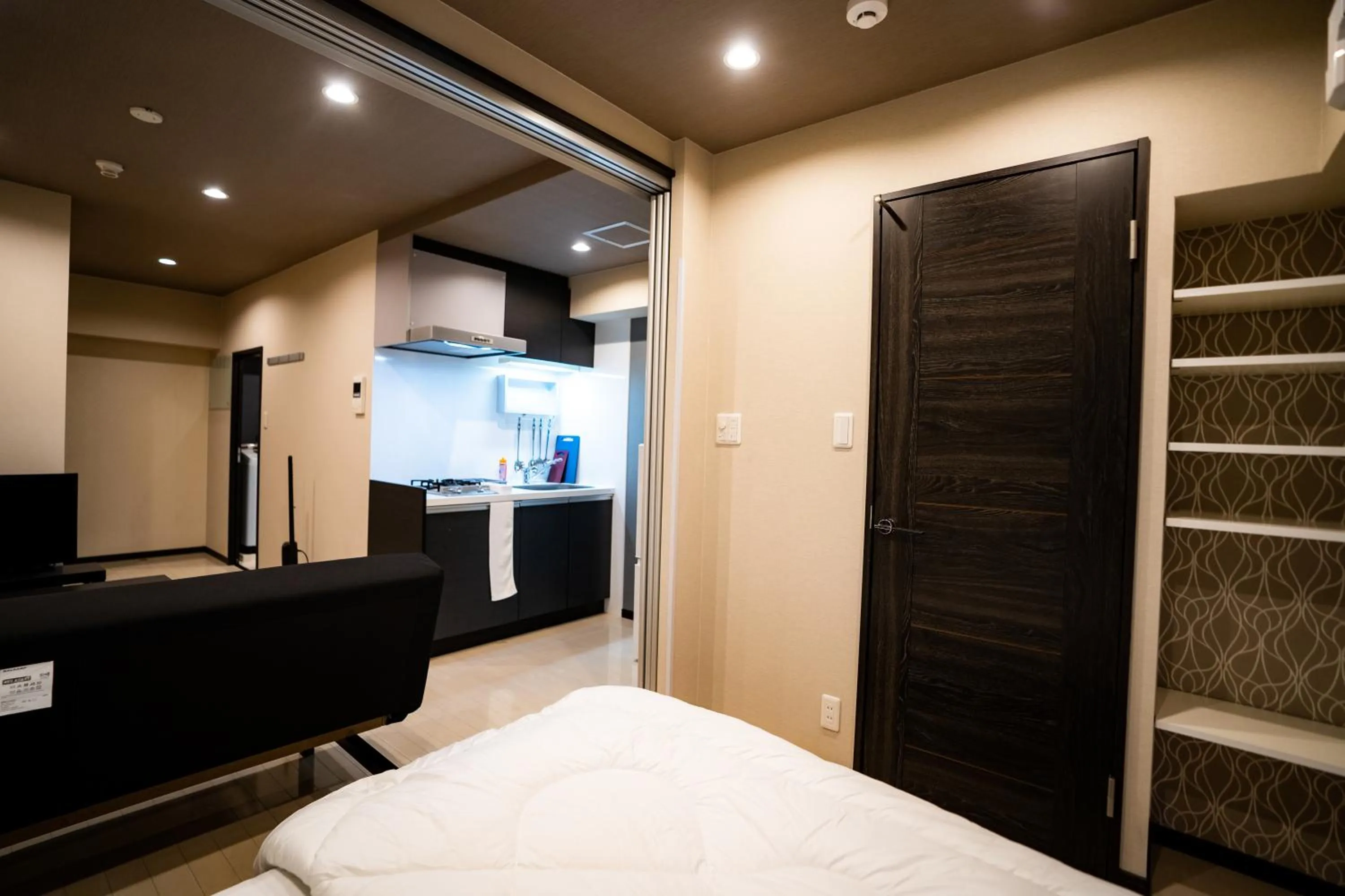 Kitchen or kitchenette, Bed in Sakimoto Residence Namba Minami