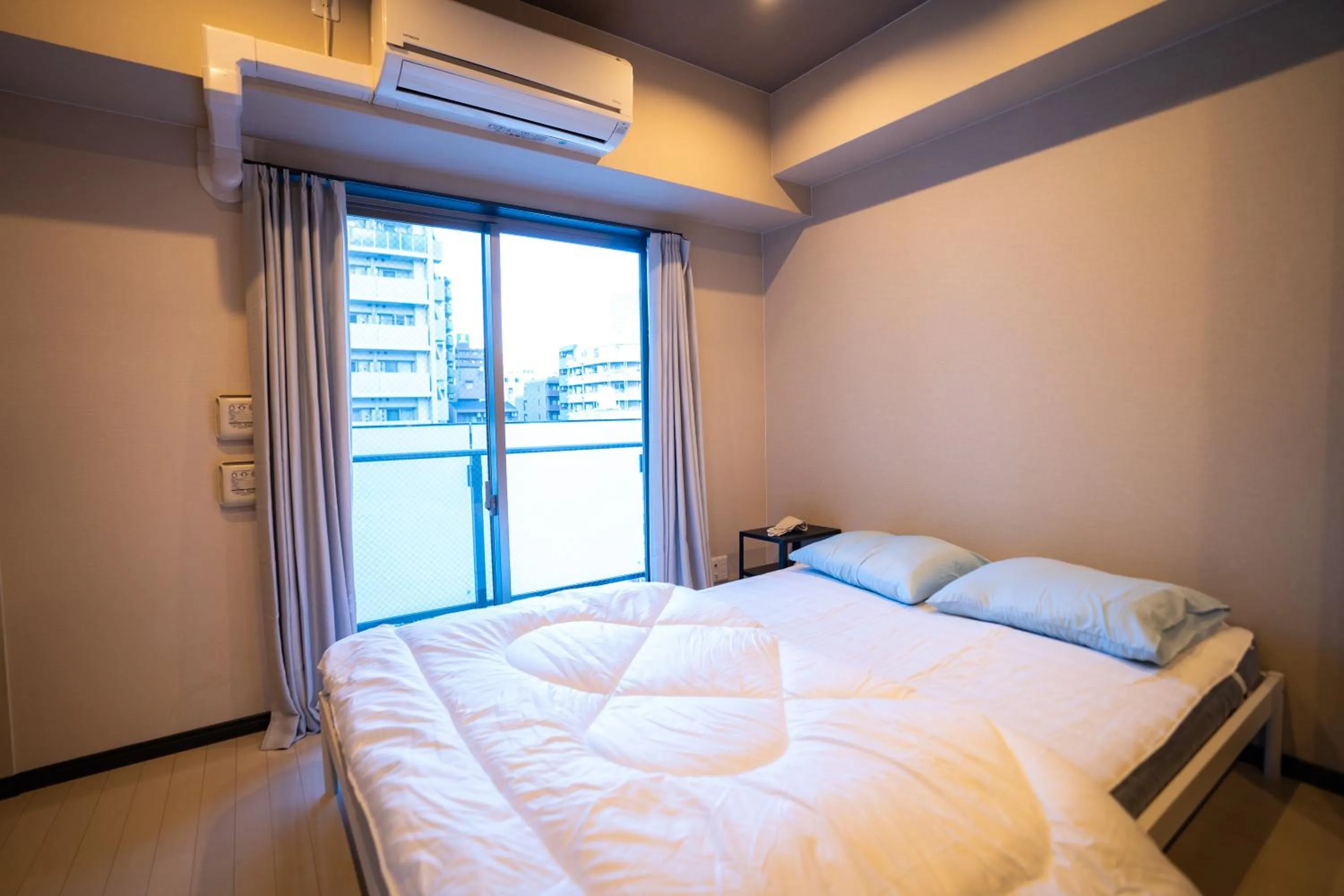 Bedroom, Bed in Sakimoto Residence Namba Minami