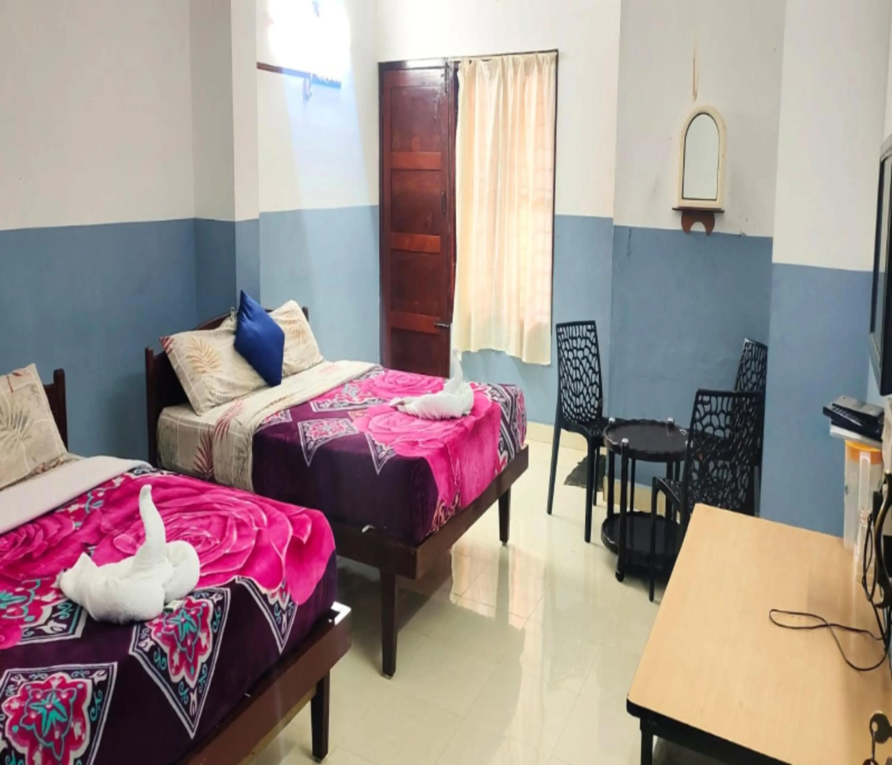 Photo of the whole room, Bed in AC MIST