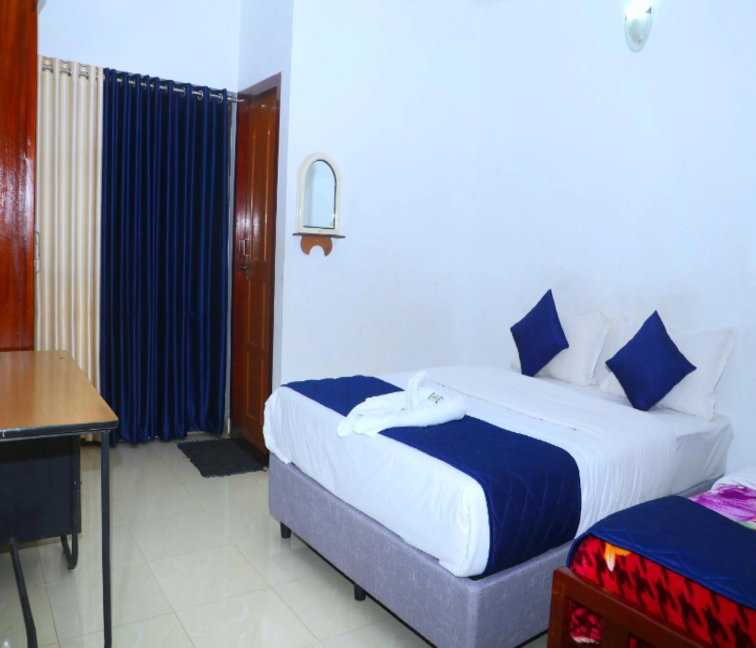 Photo of the whole room, Bed in AC MIST