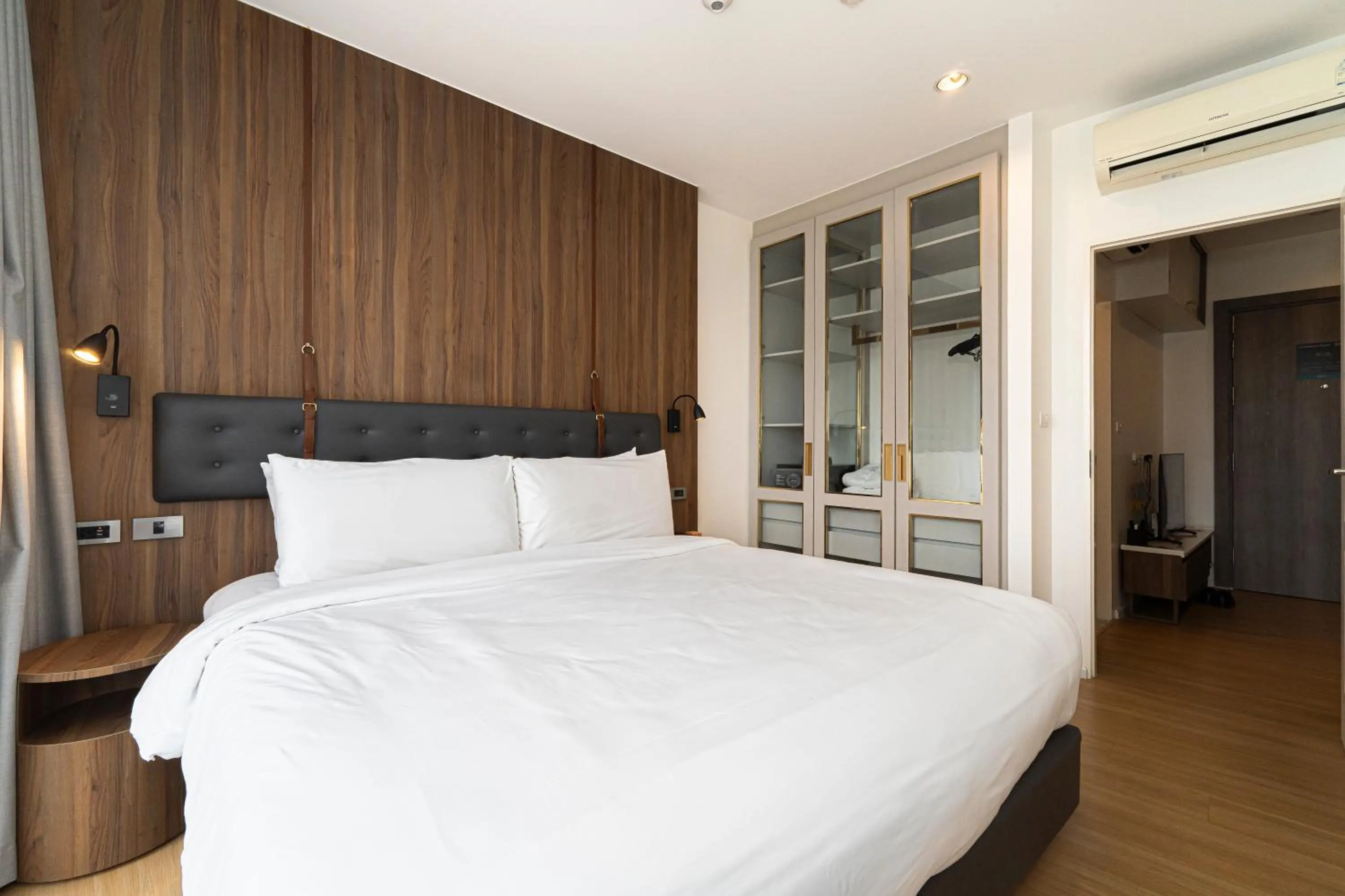 Bed in Oakwood Suites Tiwanon Bangkok