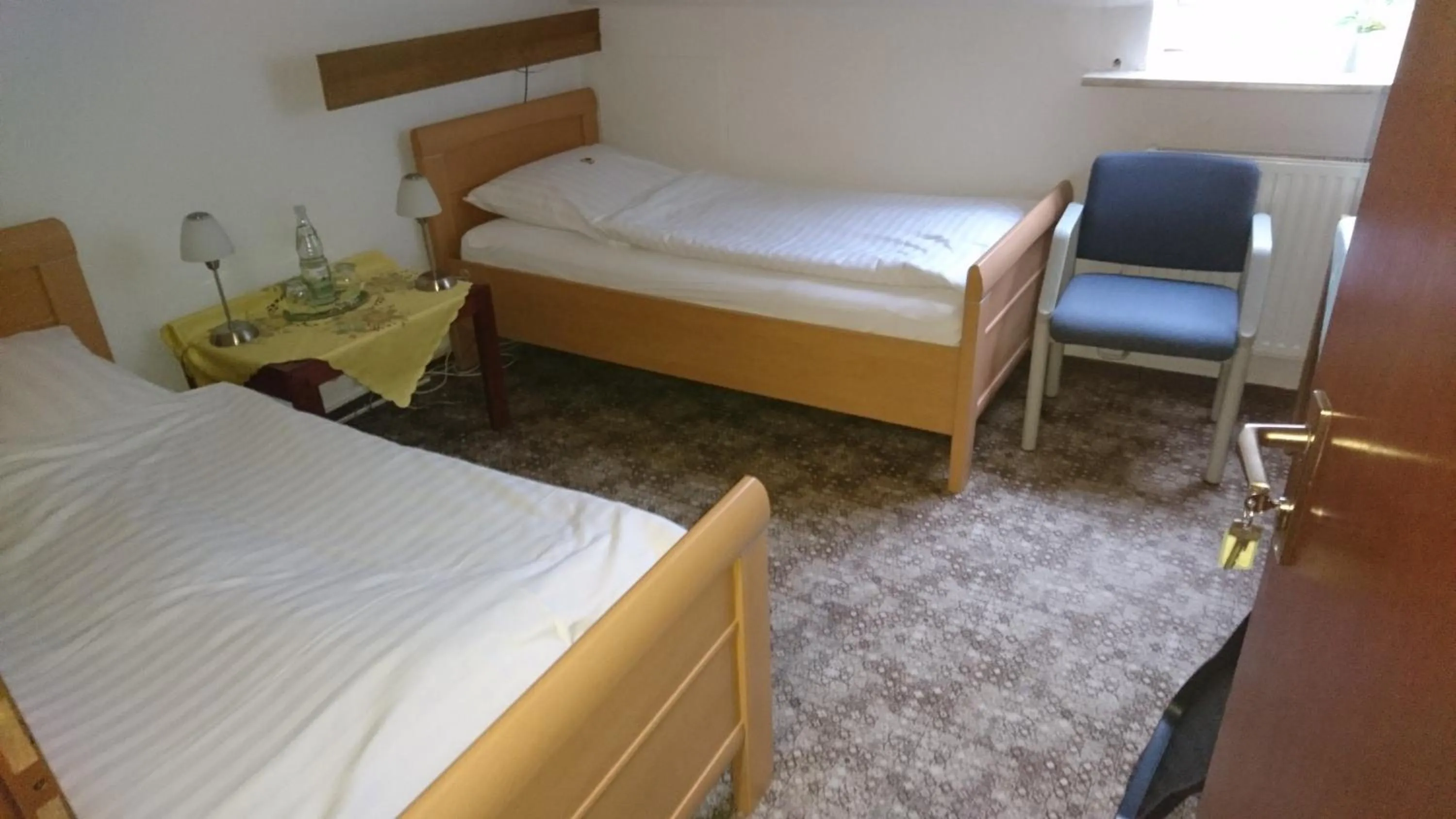Photo of the whole room, Bed in Quellenhof Altenau