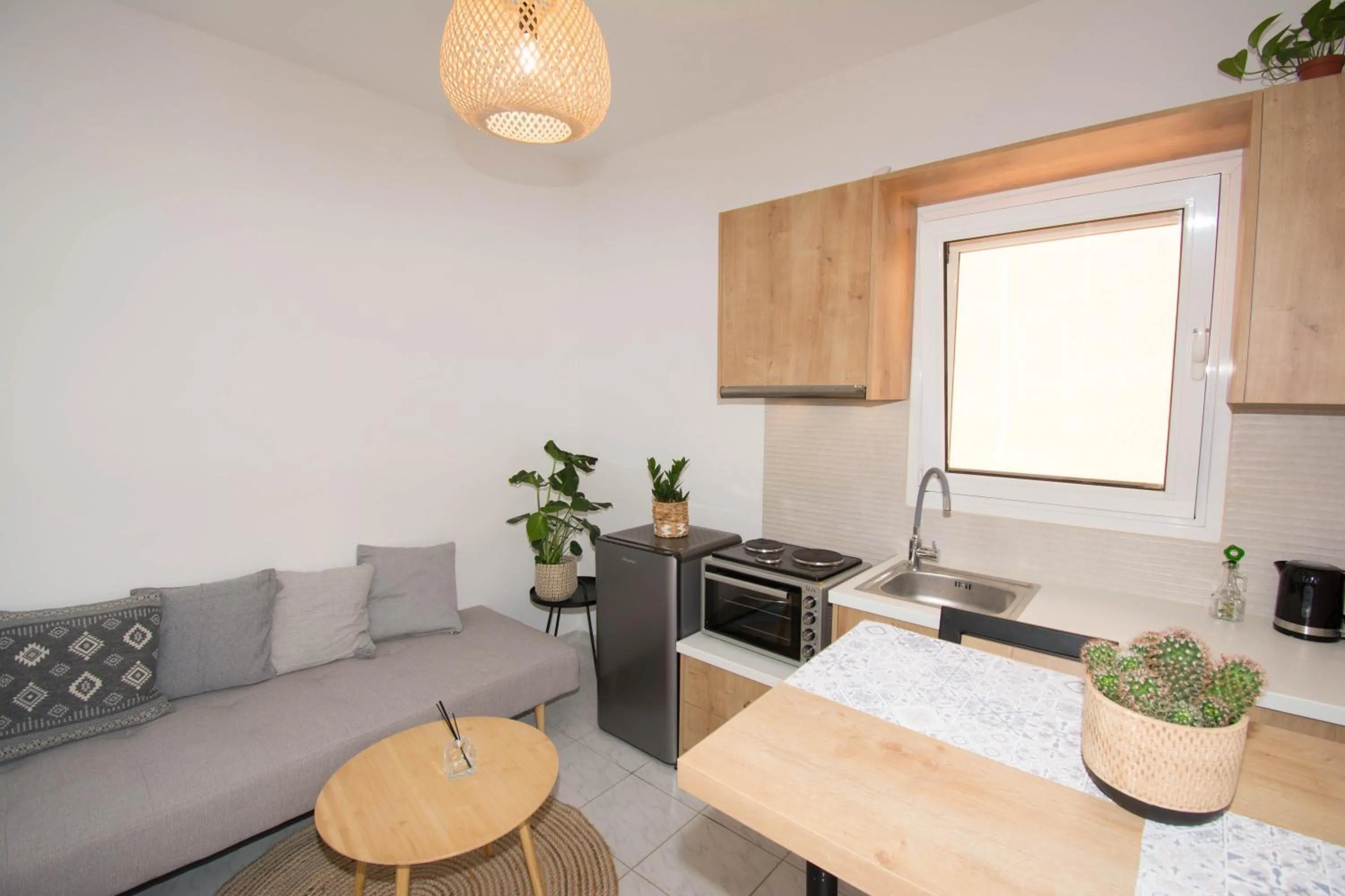 Kitchen or kitchenette in Jasmine Suites "By Checkin"