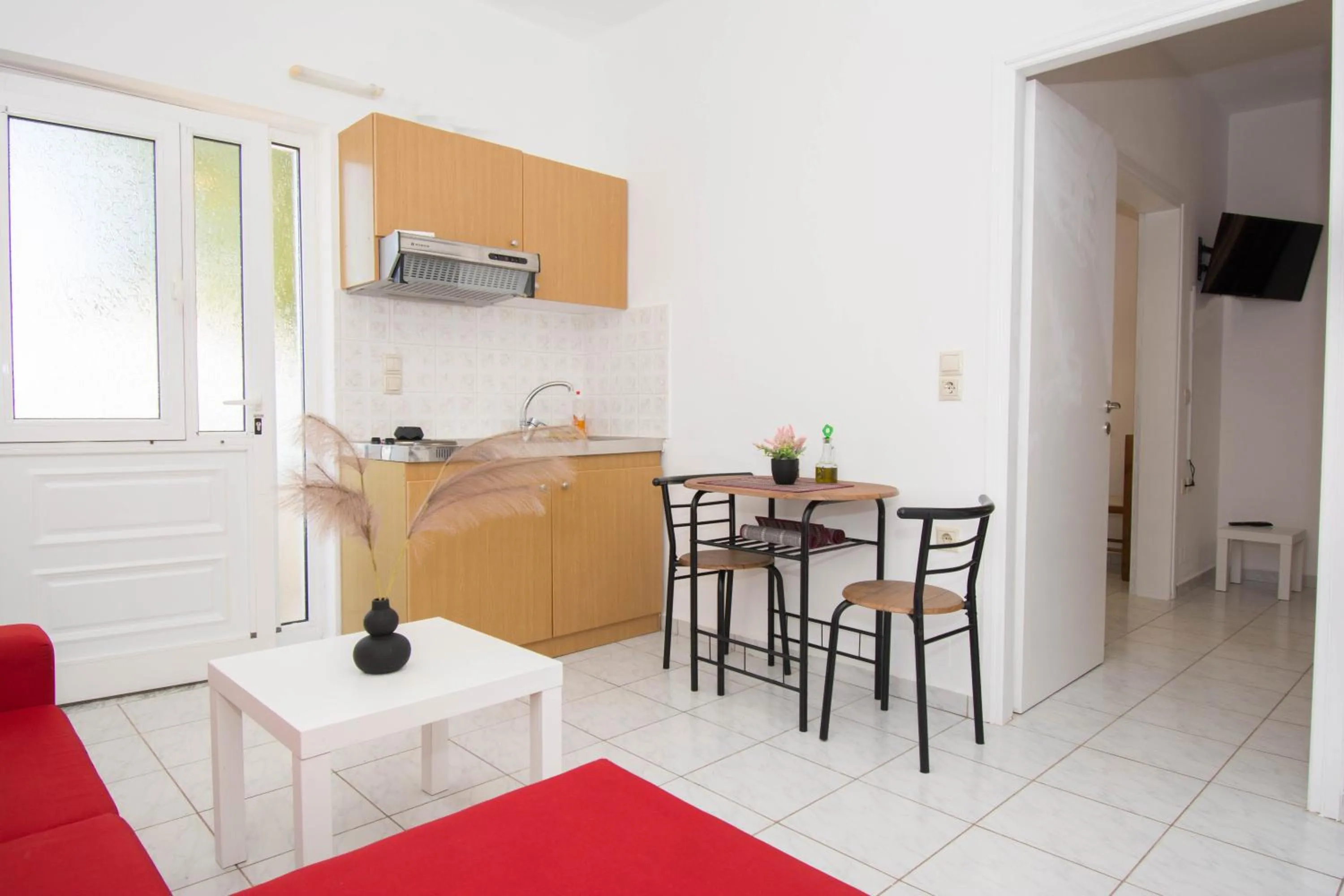 Kitchen or kitchenette in Jasmine Suites "By Checkin"
