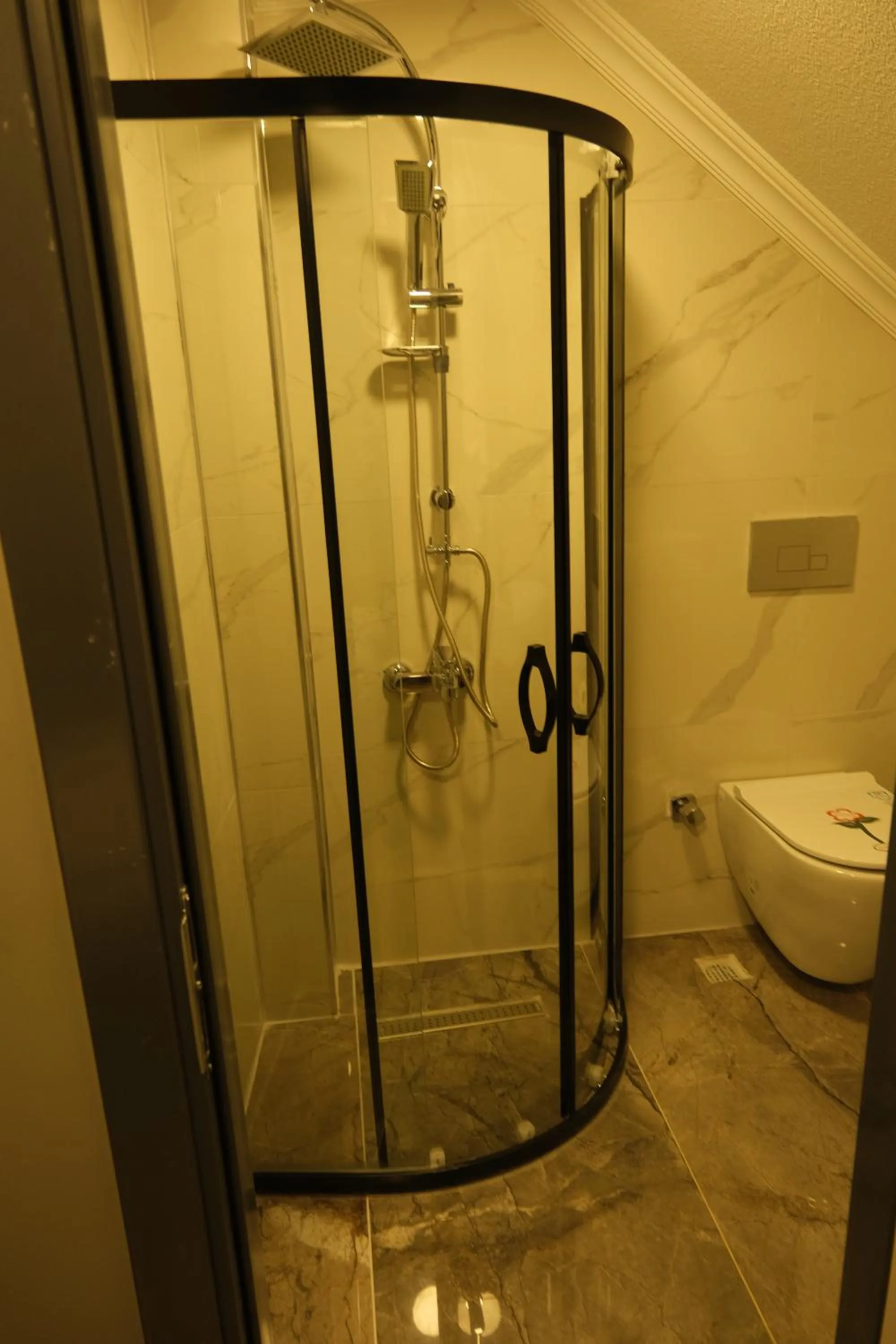 Shower in The Pearl Airport Hotel