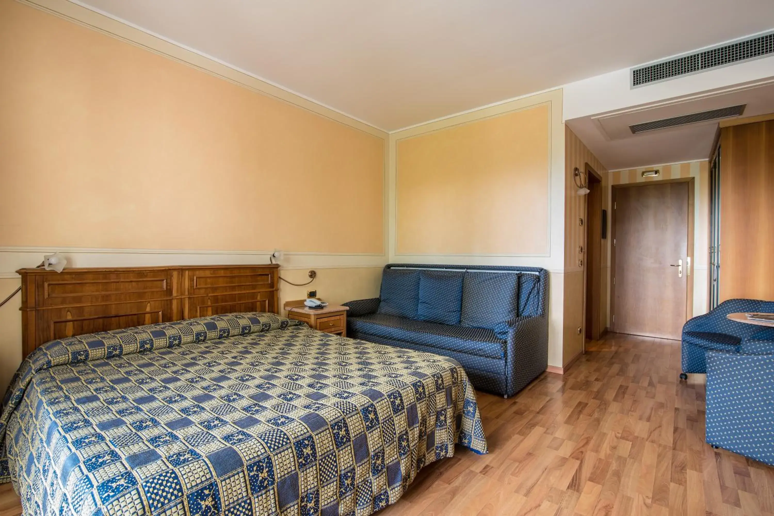 Family Room in AHG Golf Hotel Porta Del Sole Family Room in AHG Golf Hotel Porta Del Sole